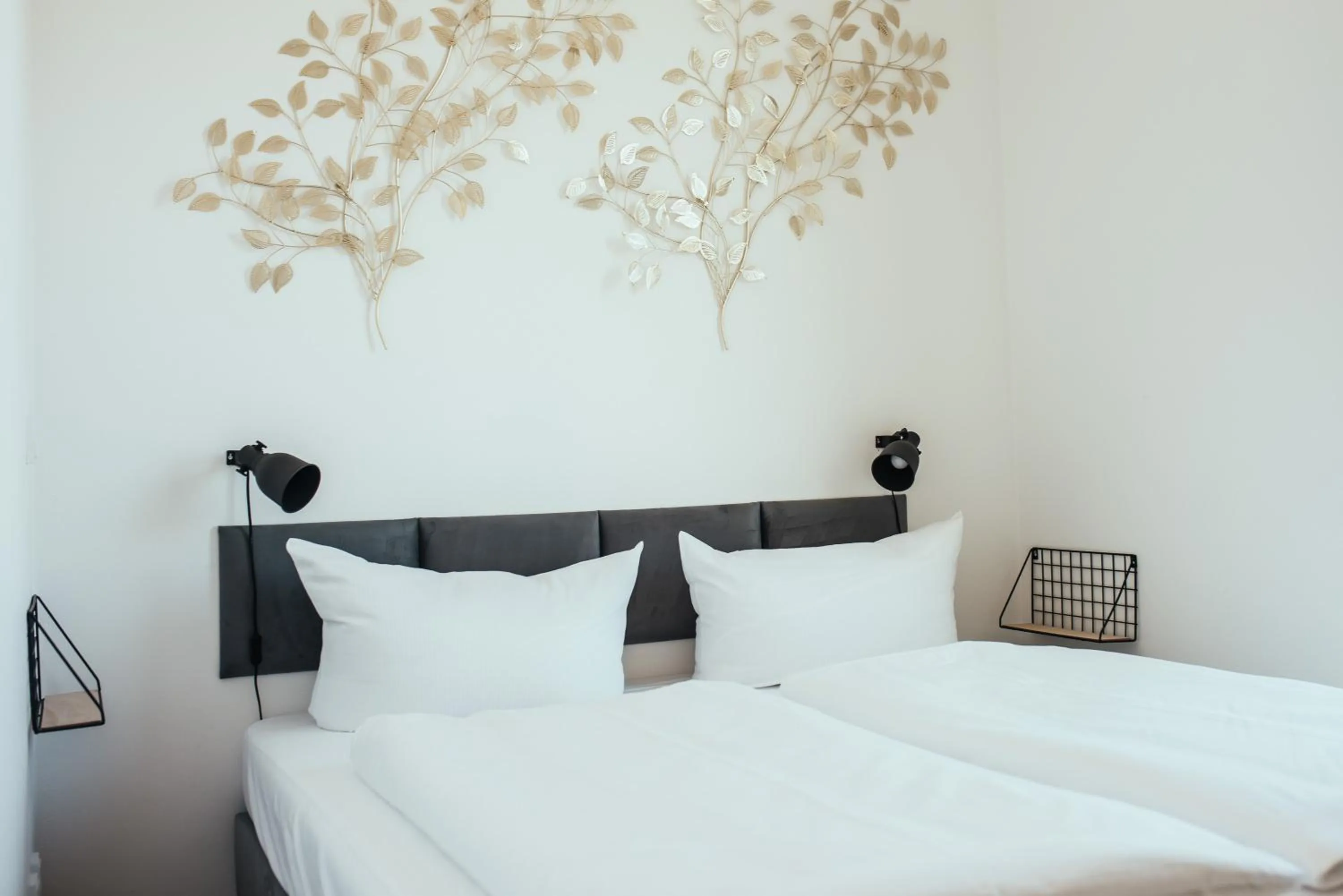 Bed in The Rix Studios & Suites