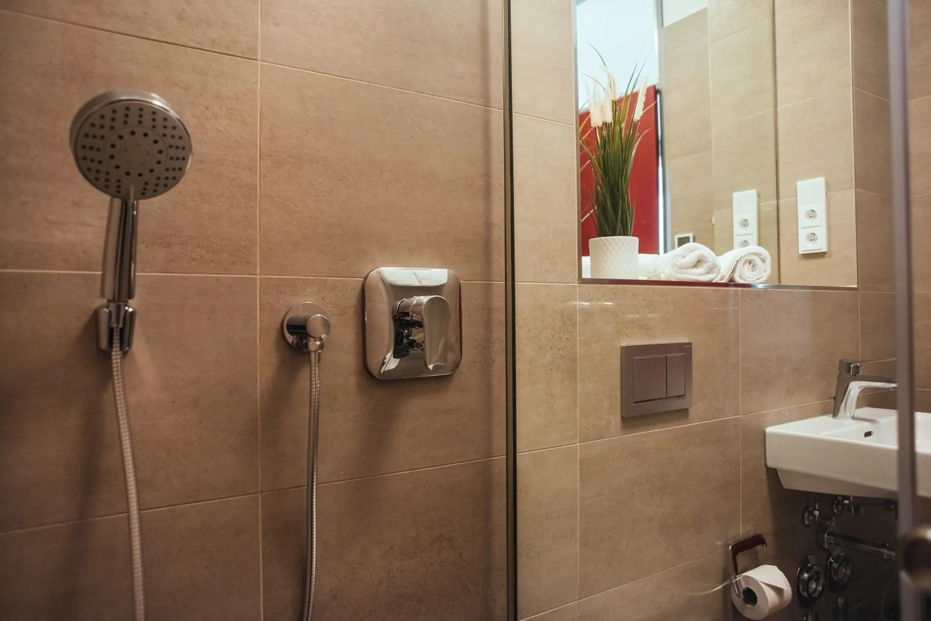 Shower in The Rix Studios & Suites