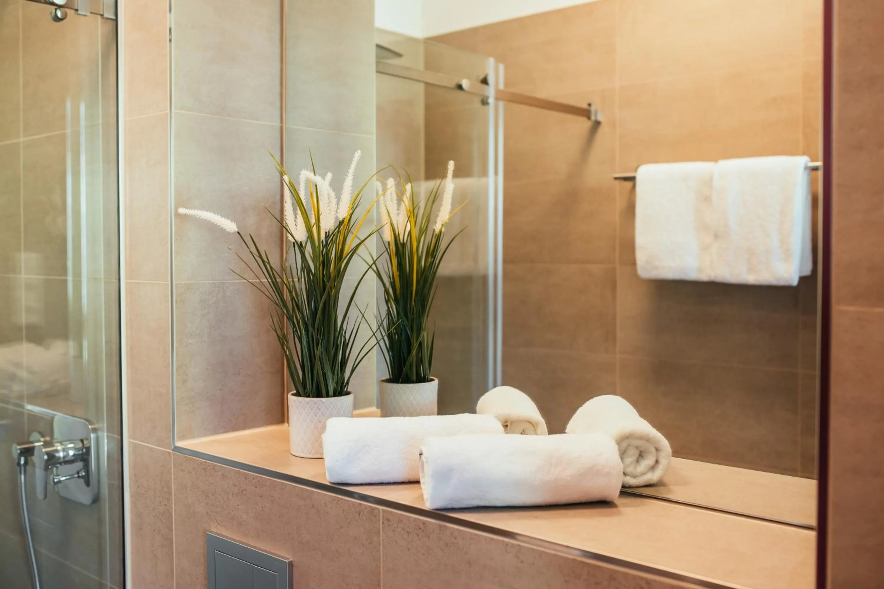 Shower in The Rix Studios & Suites