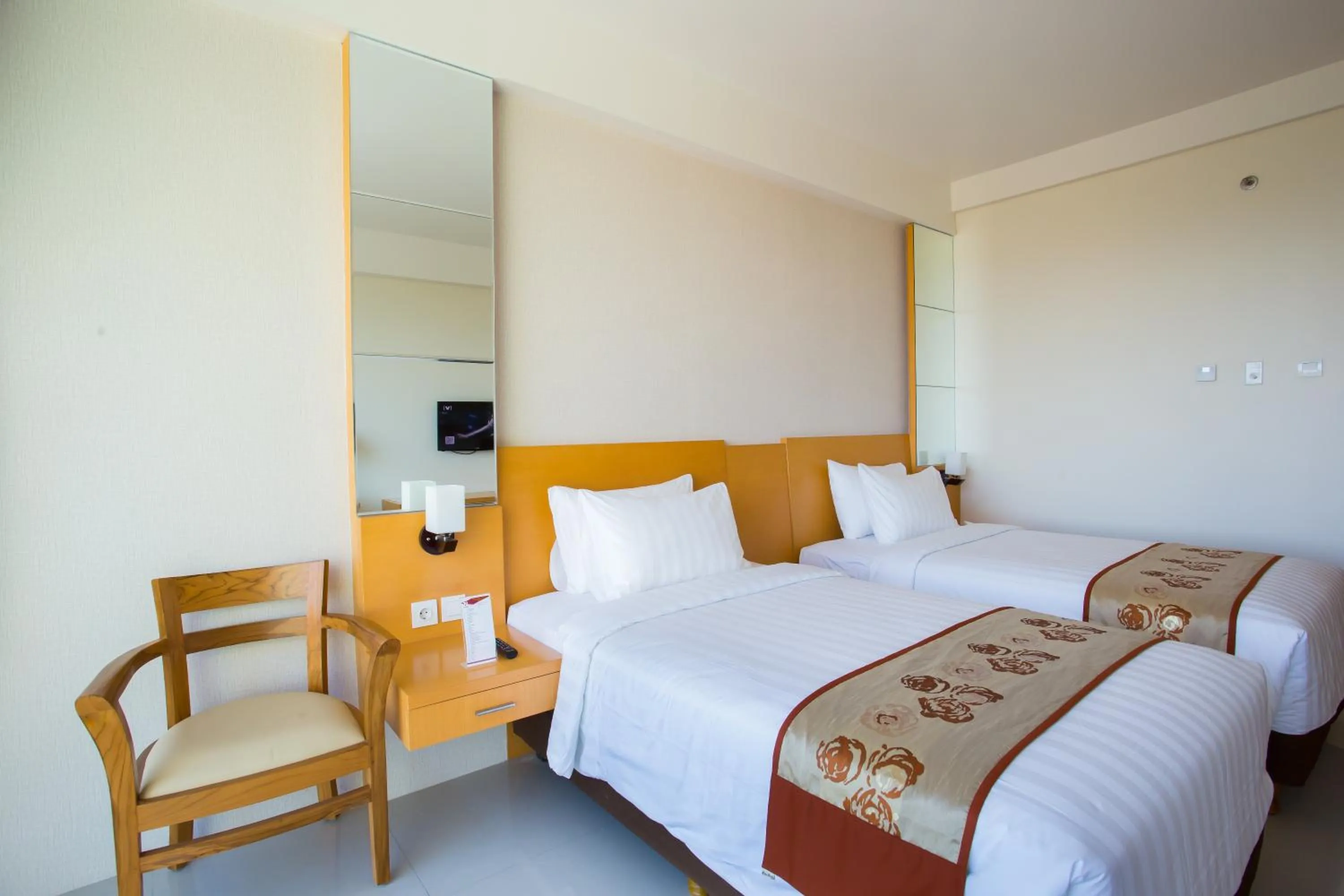 Photo of the whole room, Bed in Golden Palace Hotel Lombok