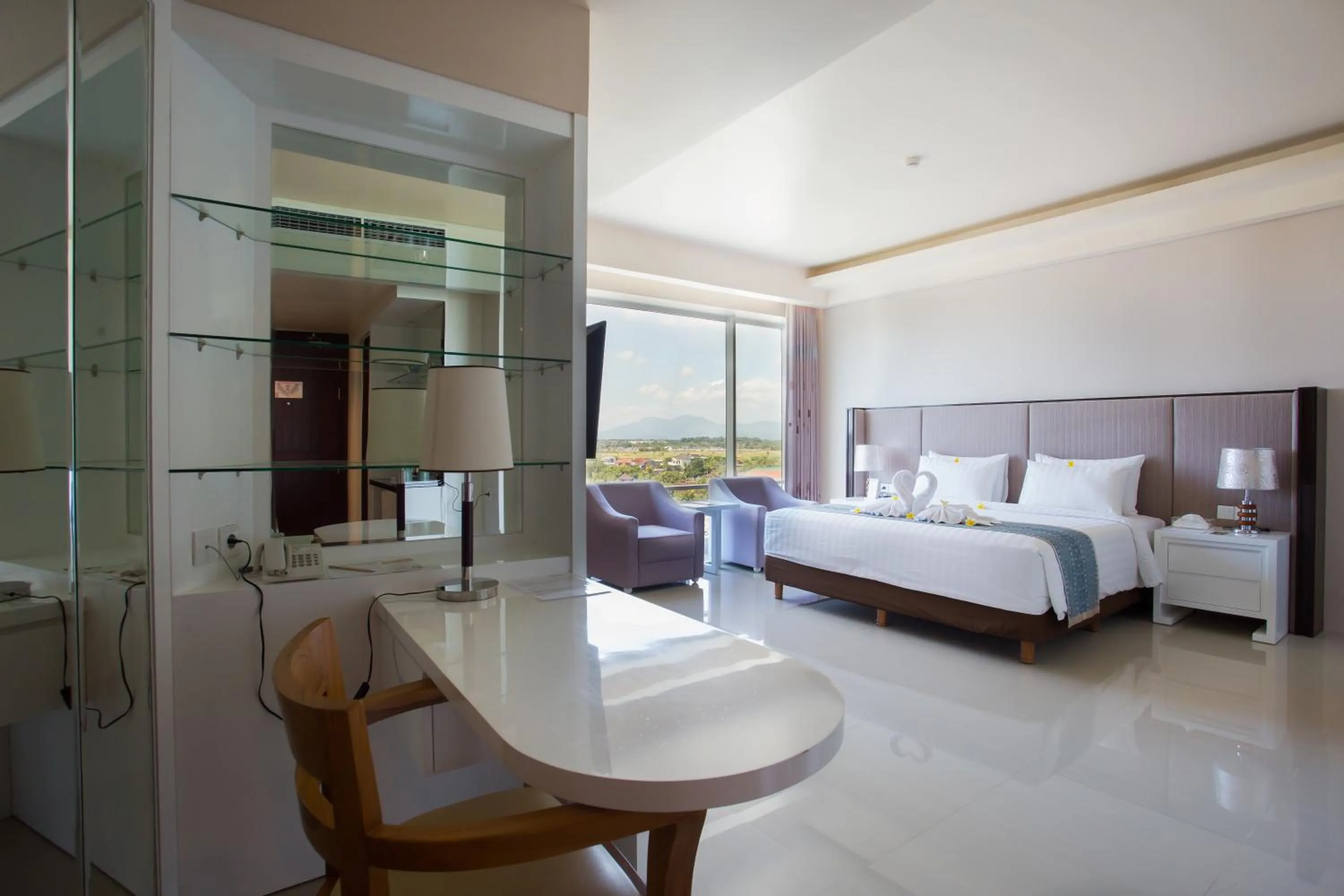 Photo of the whole room, Bed in Golden Palace Hotel Lombok