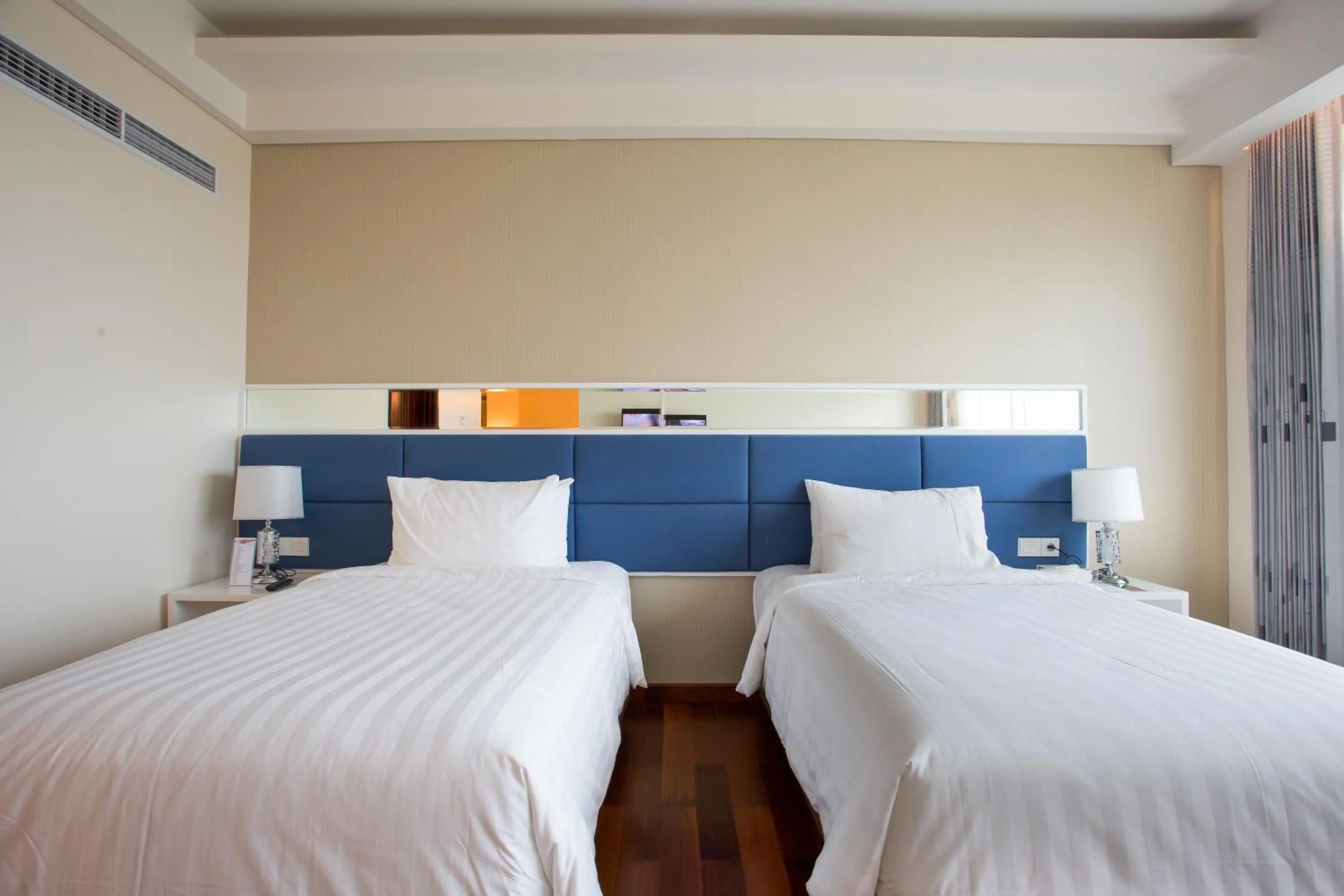 Bed in Golden Palace Hotel Lombok