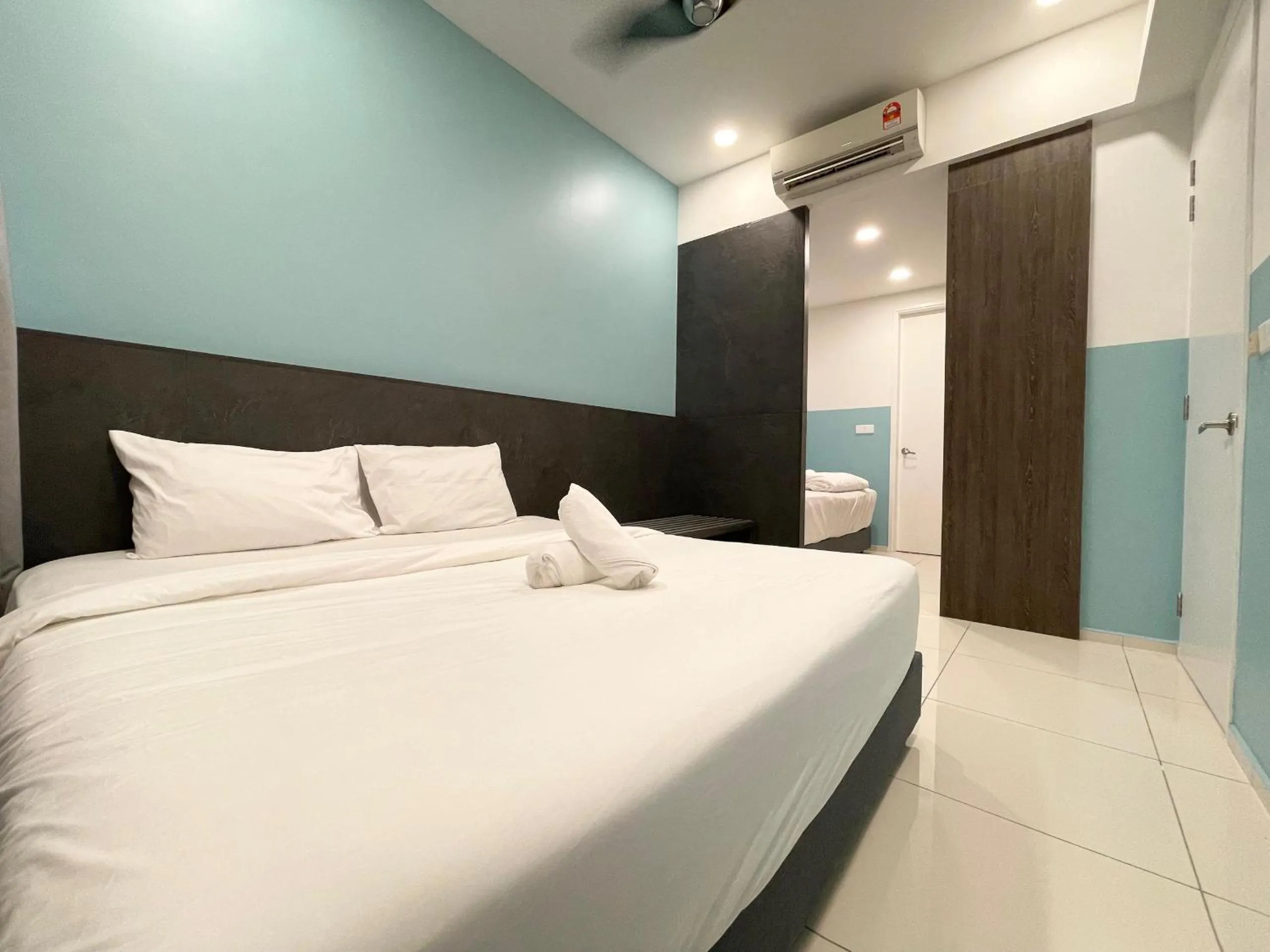 Bed in The Robertson-Bukit Bintang by PILLOWTALKS