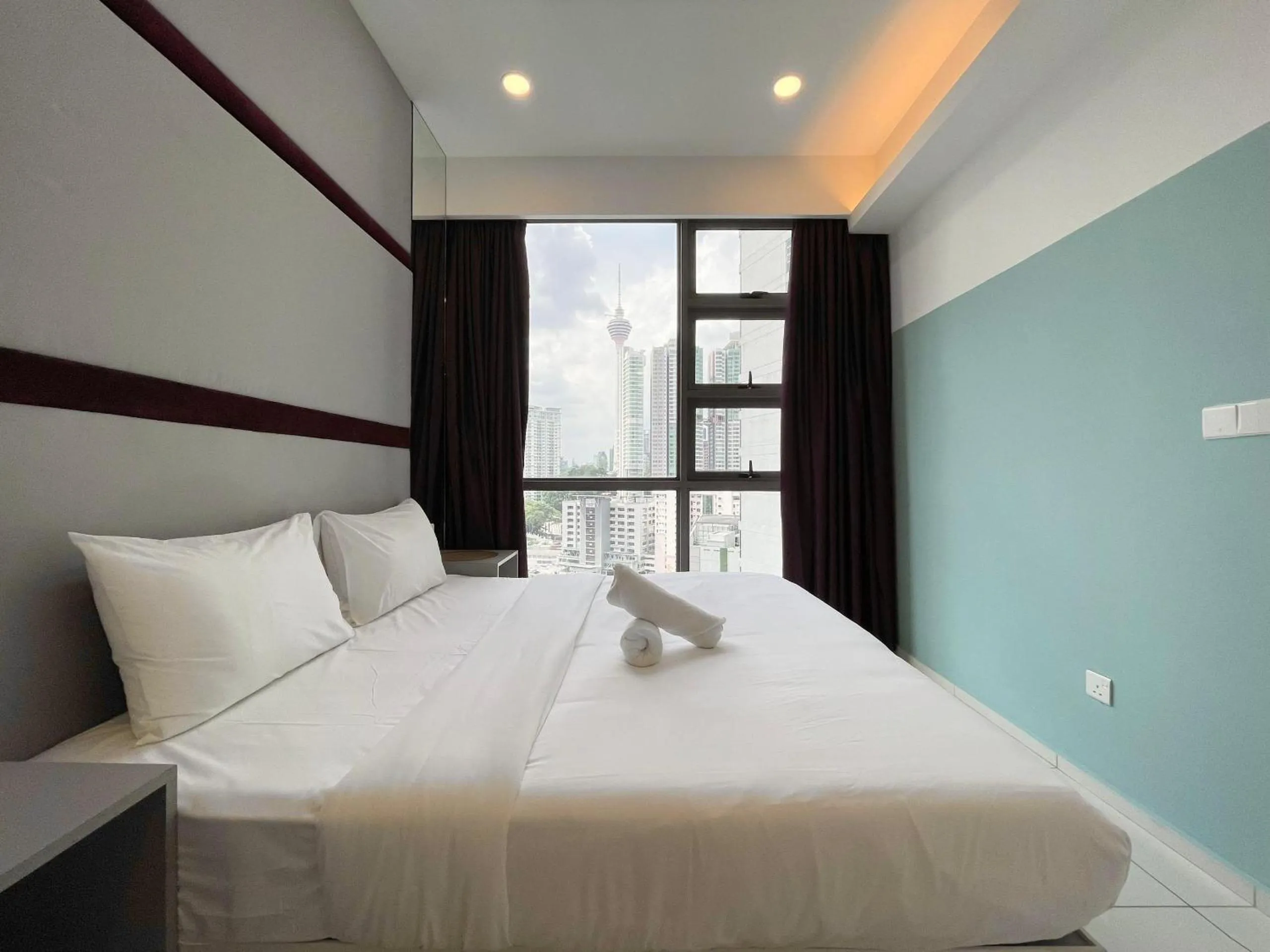 Bed in The Robertson-Bukit Bintang by PILLOWTALKS