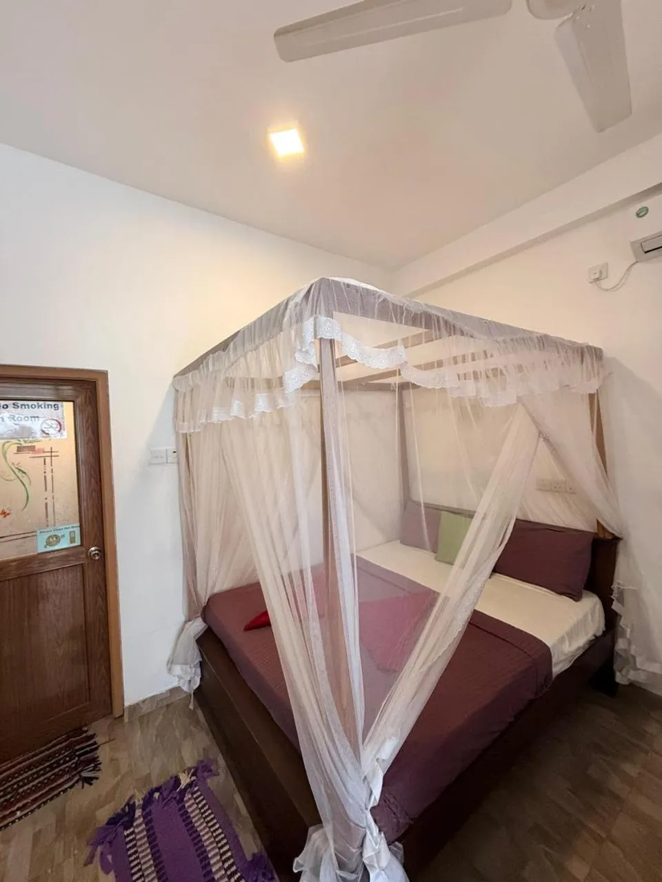 Bed in Pearl Deluna Resort Mirissa