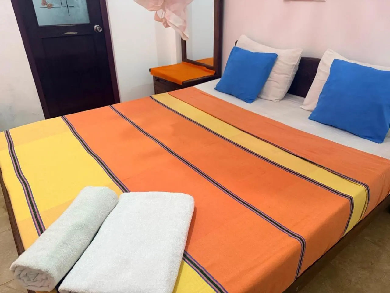 Bed in Pearl Deluna Resort Mirissa