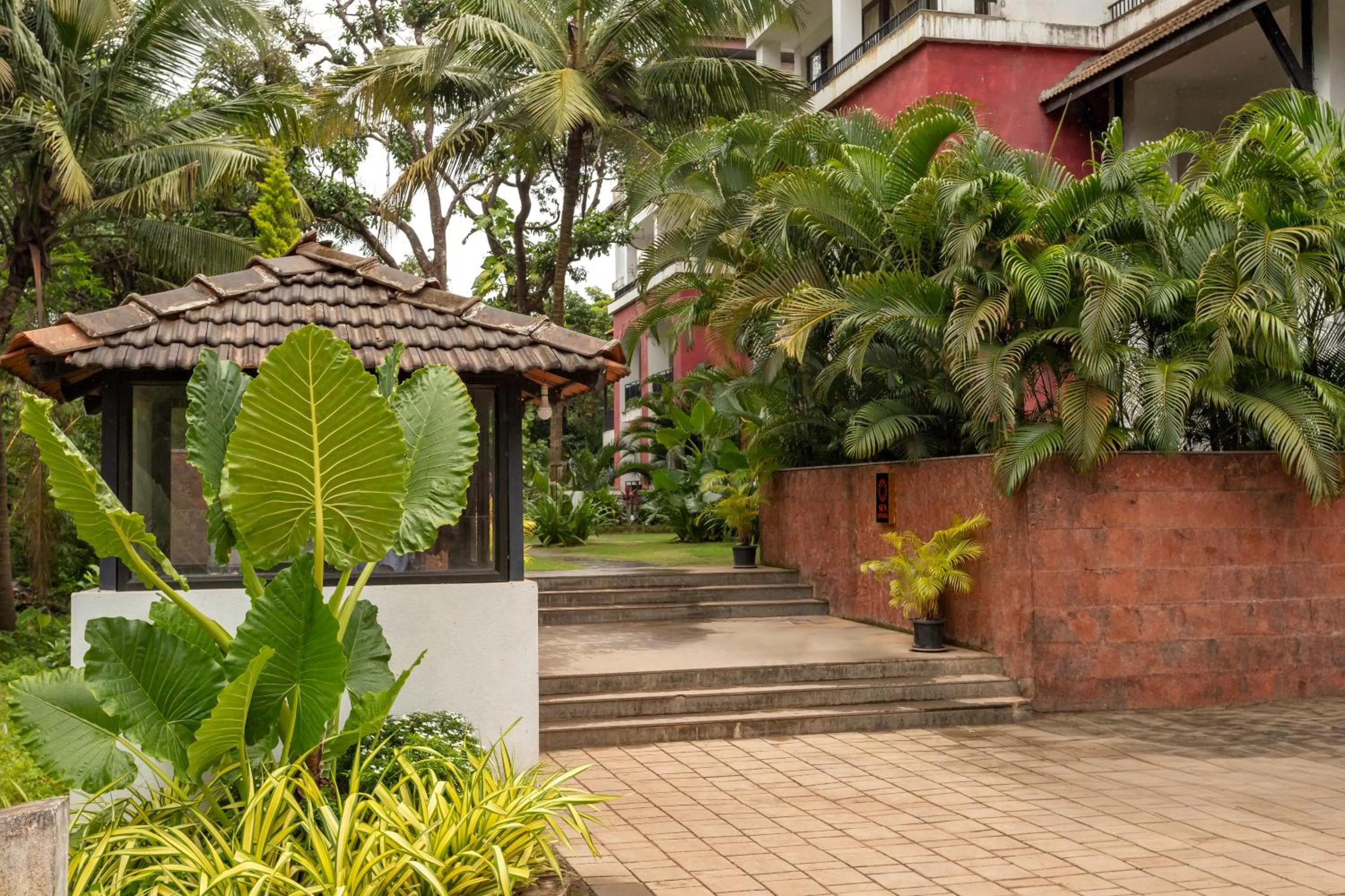 Property building in D'Retreat 1BHK Apartment by tisyastays