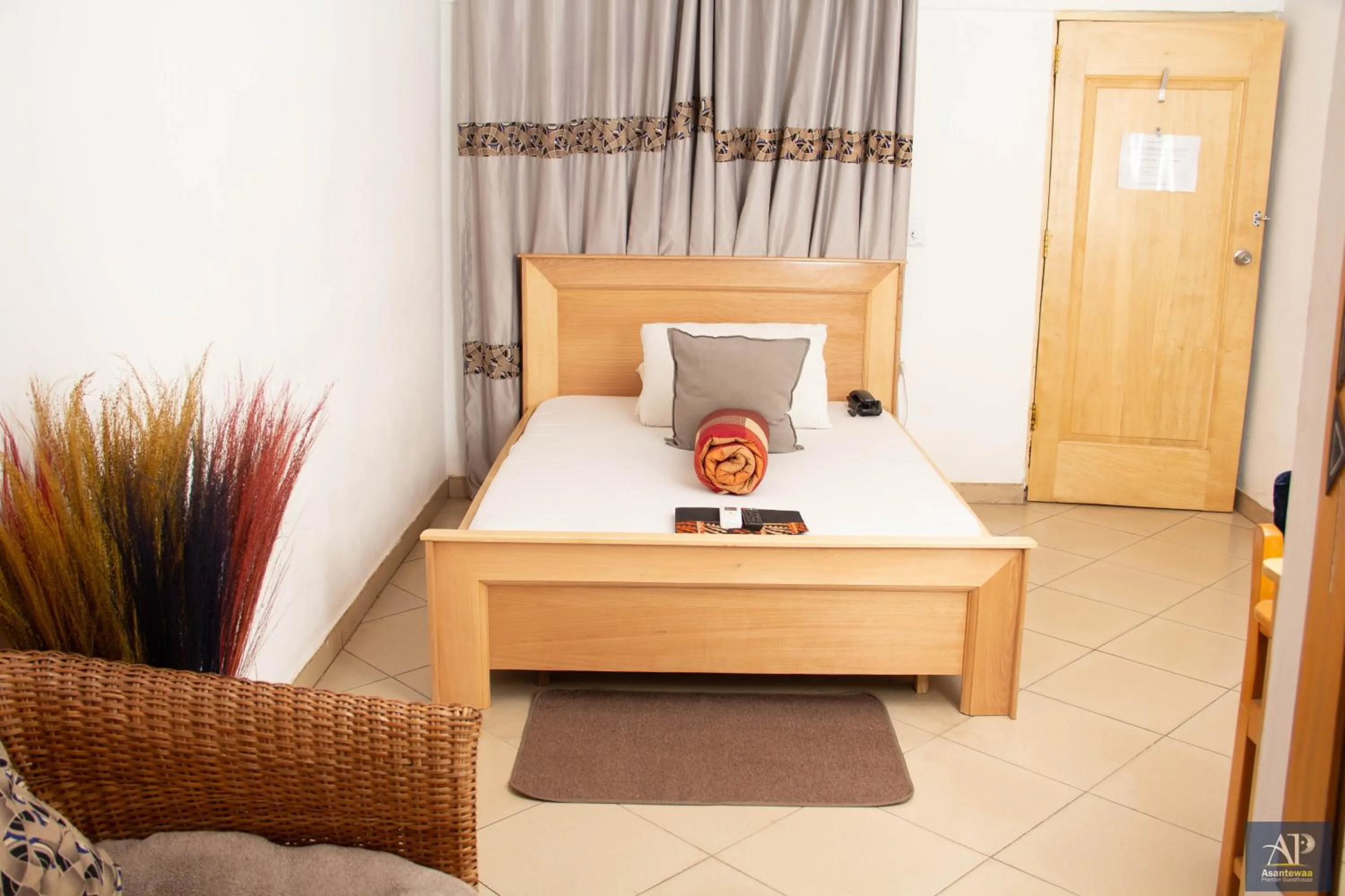 Bed in Asantewaa Premier Hotel