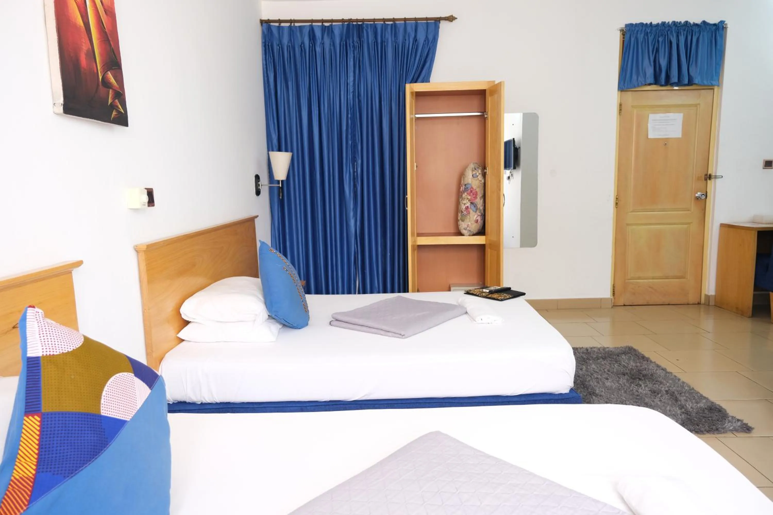 Bed in Asantewaa Premier Hotel