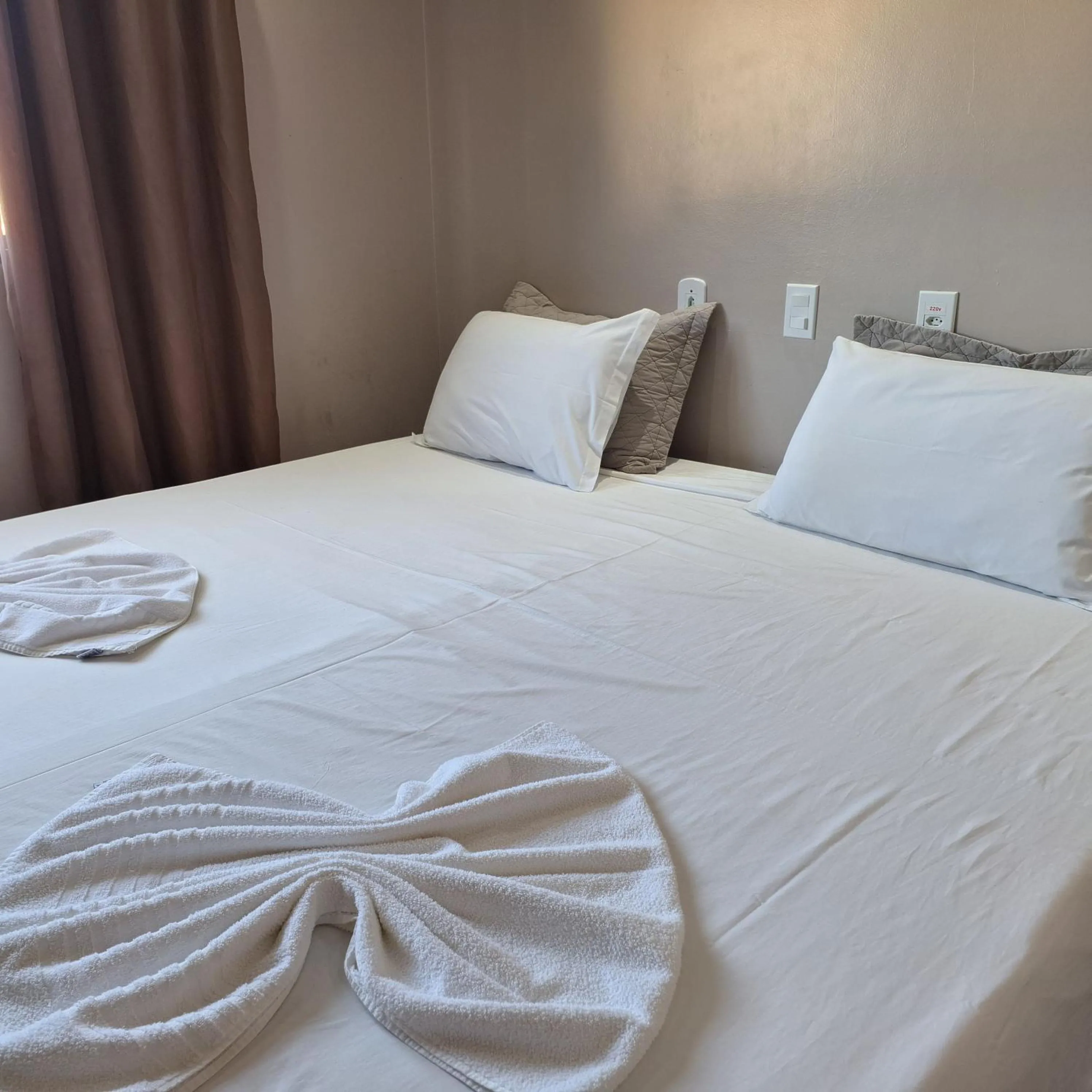 Bed in Pousada Sol do Araguaia