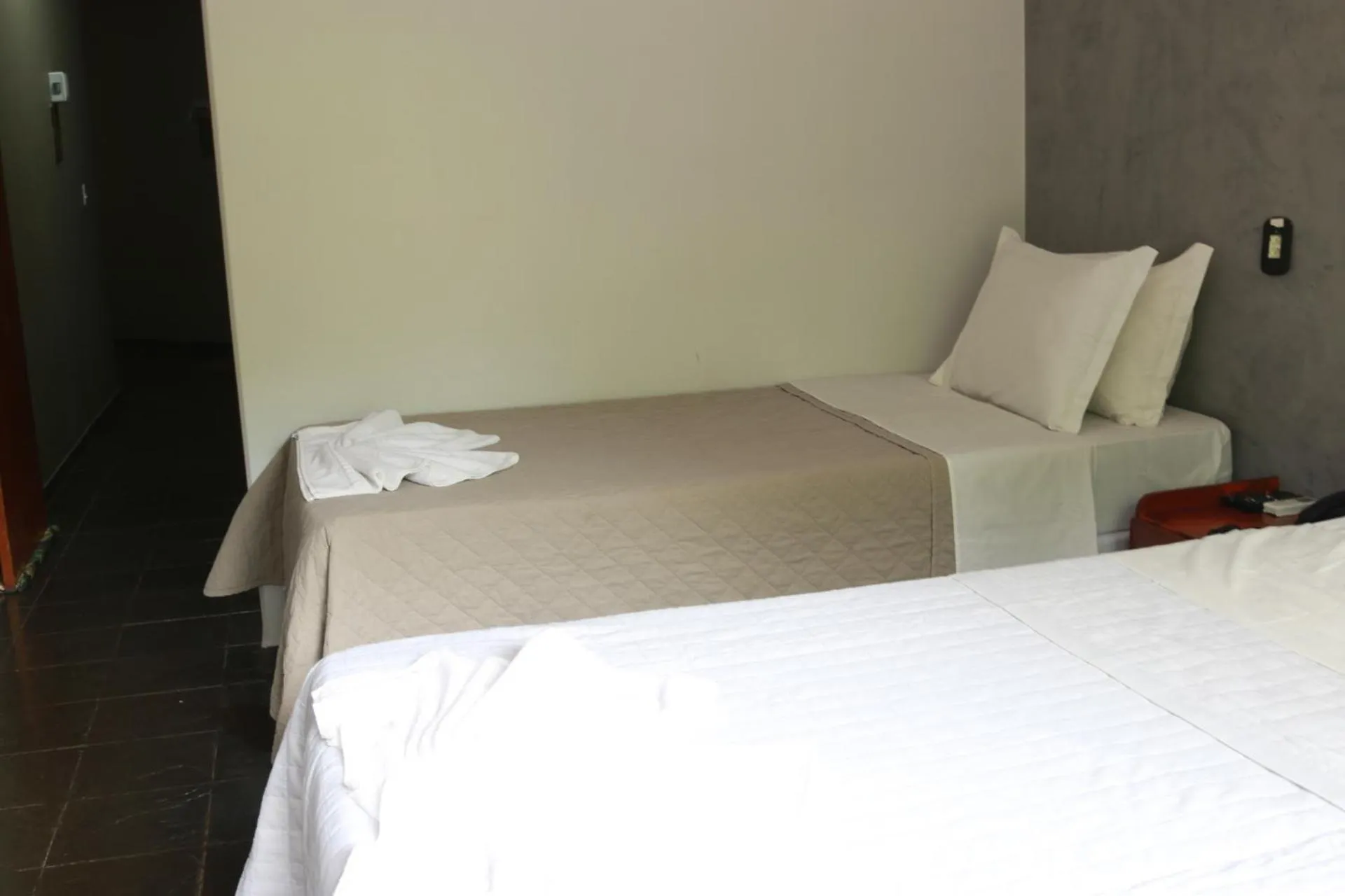 Bed in Pousada Sol do Araguaia