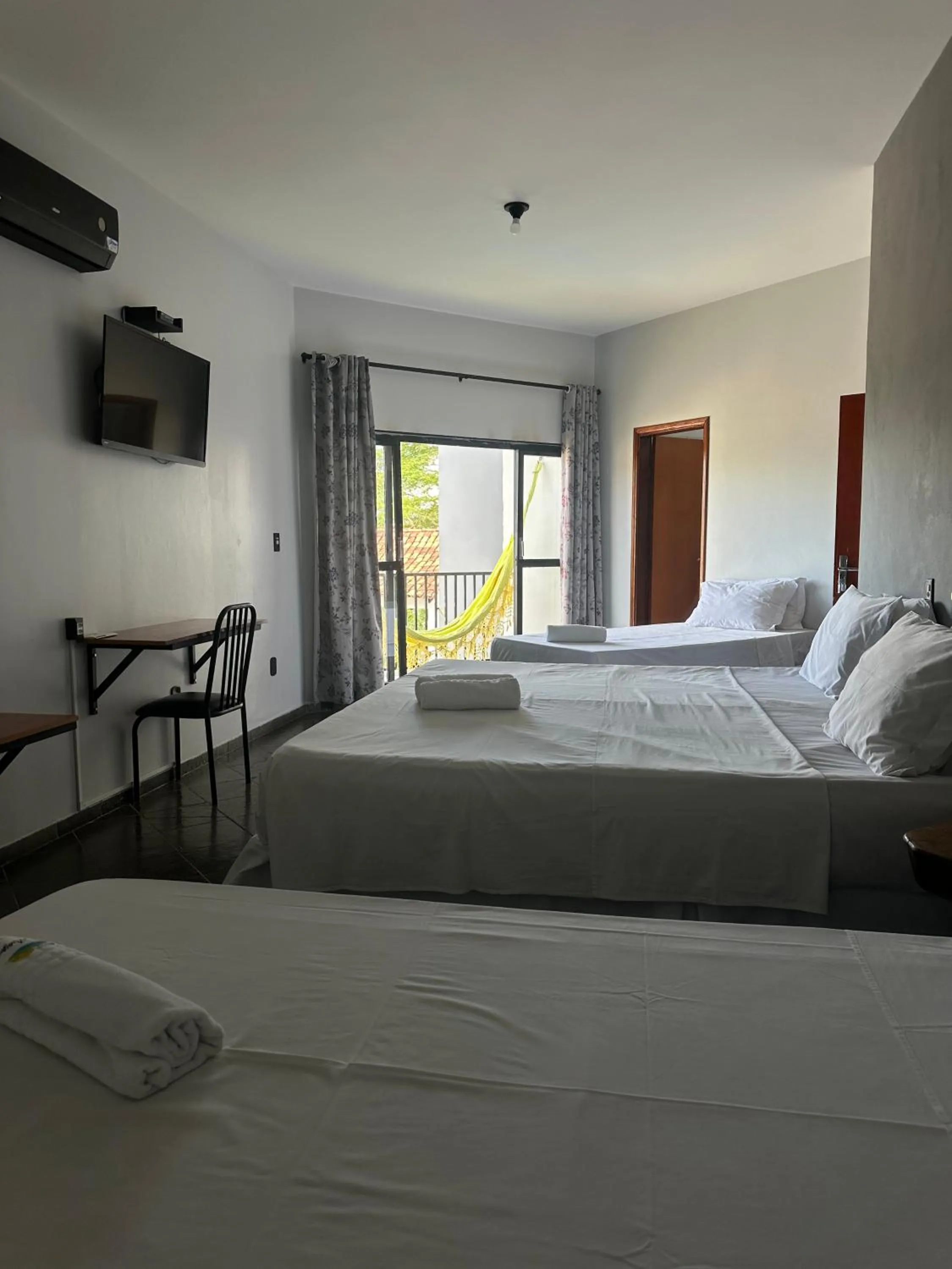 Bed in Pousada Sol do Araguaia