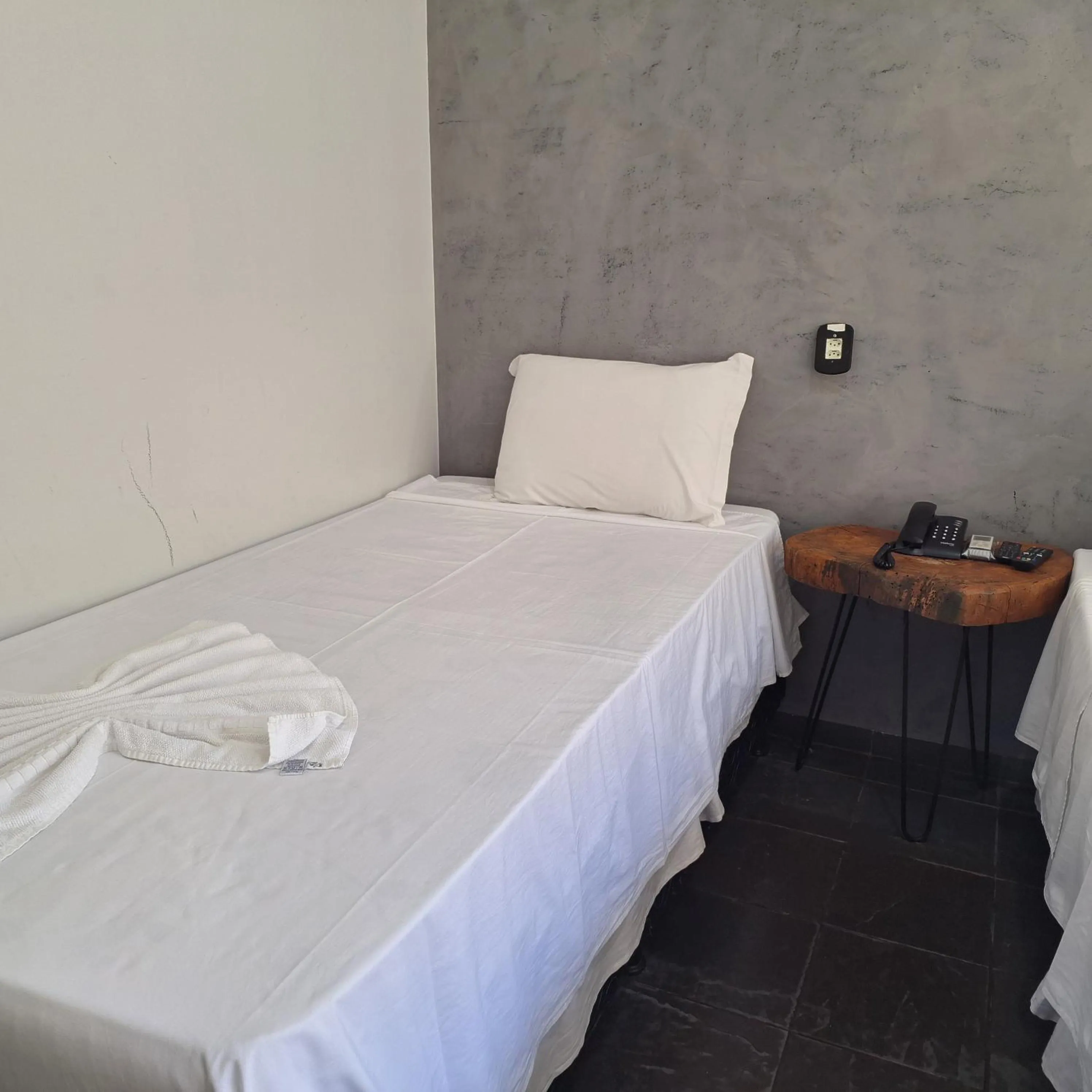 Bed in Pousada Sol do Araguaia