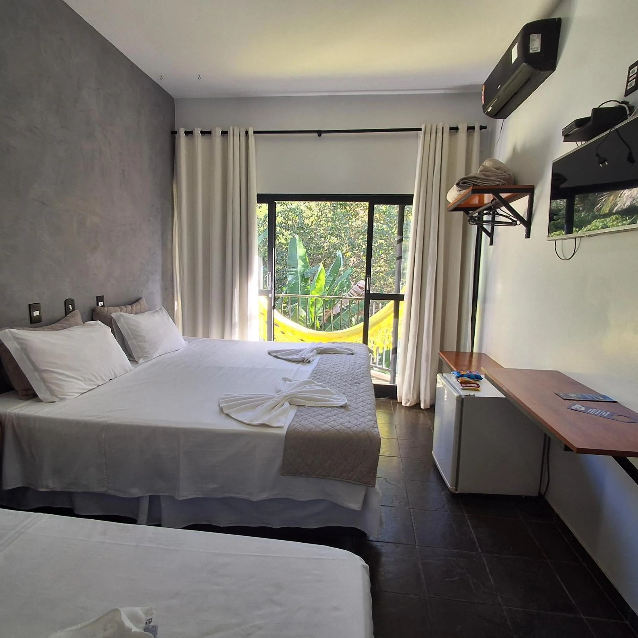 Bed in Pousada Sol do Araguaia