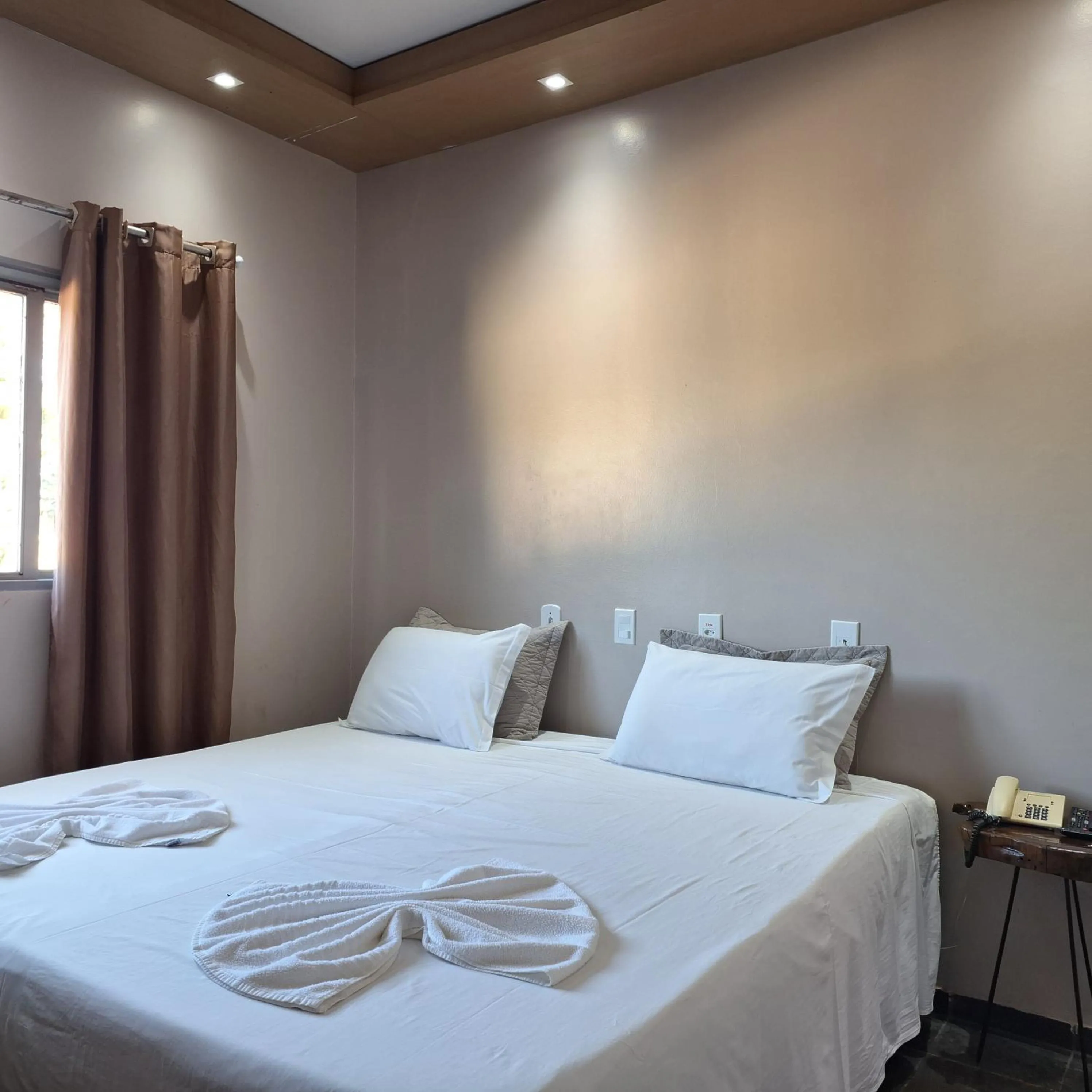 Bed in Pousada Sol do Araguaia