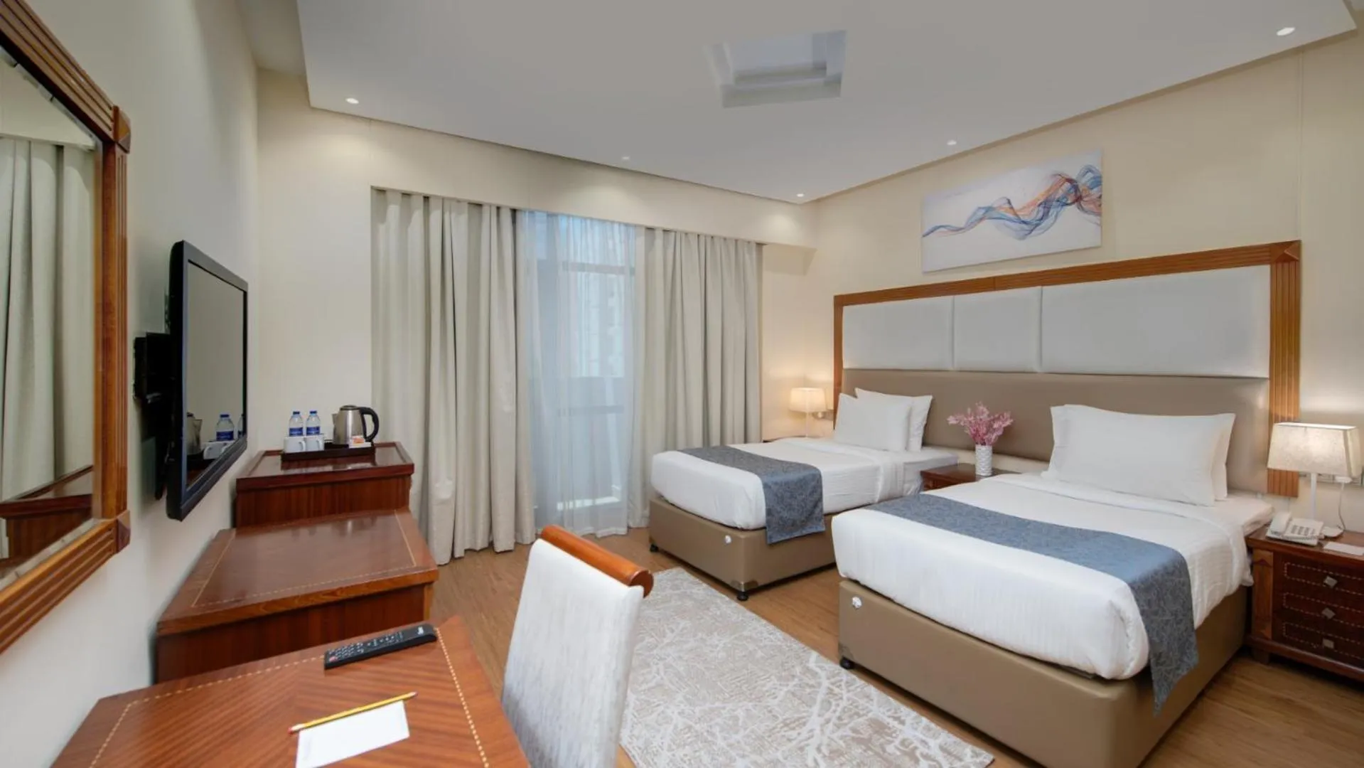 Bed in Vendome Plaza Hotel