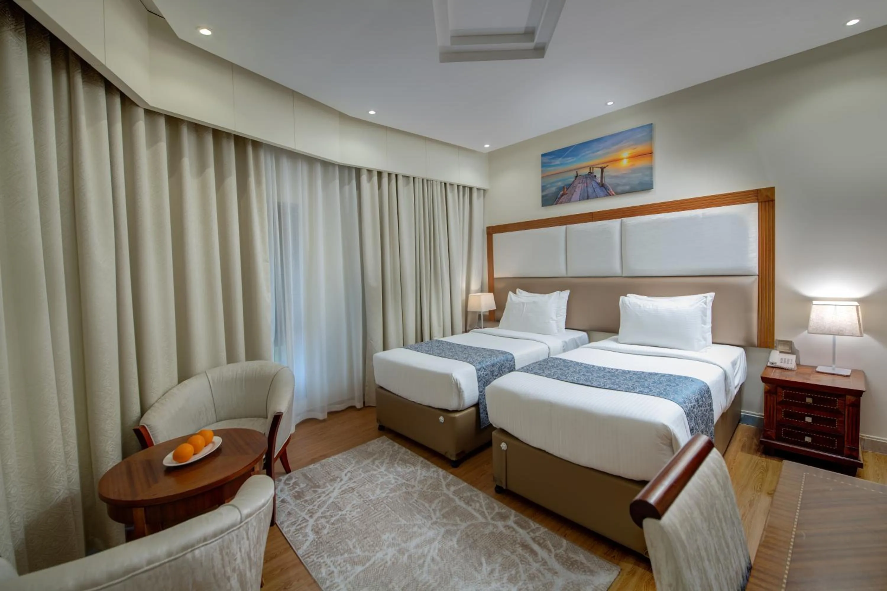 Bed in Vendome Plaza Hotel