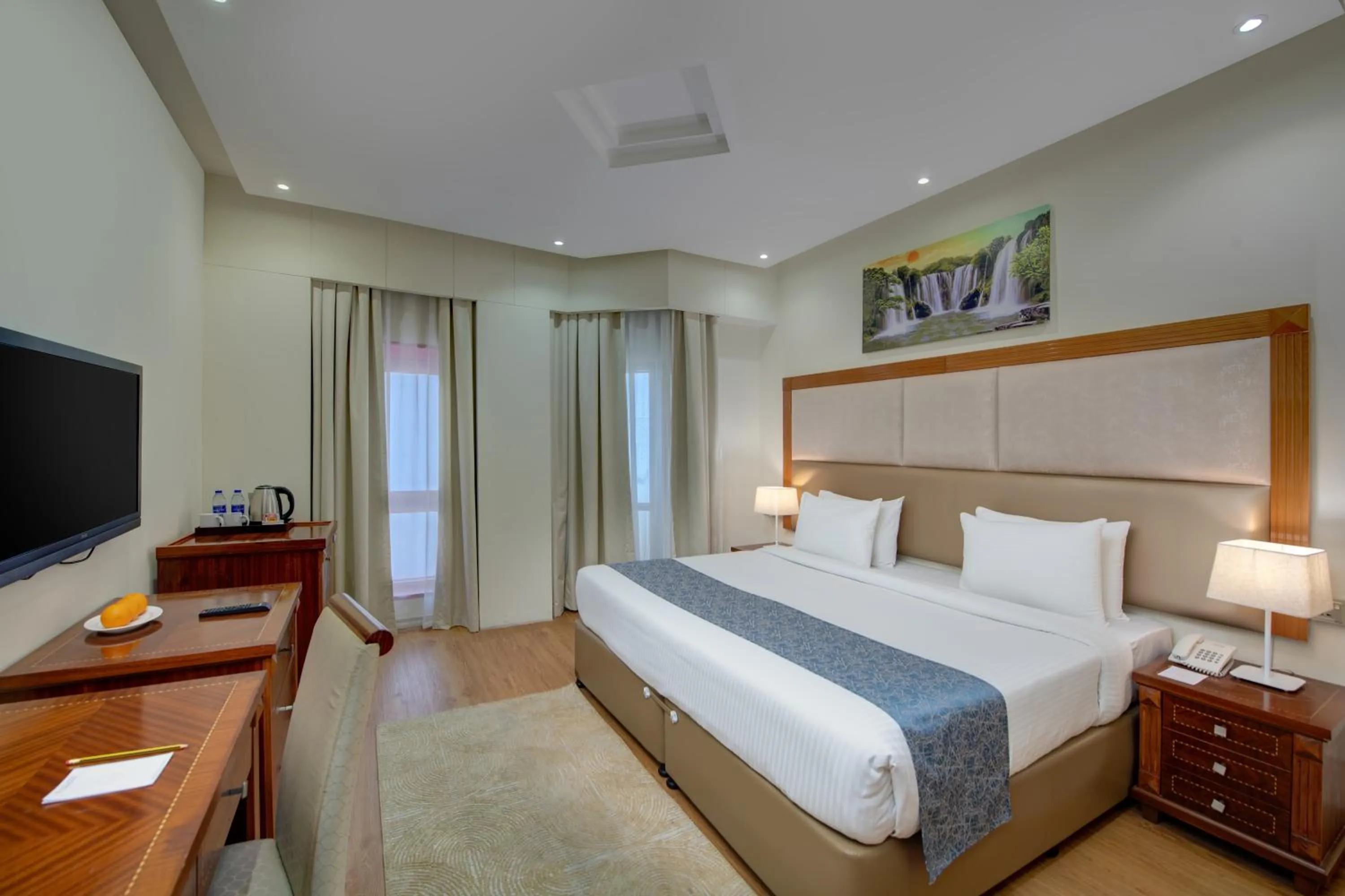 Bed in Vendome Plaza Hotel