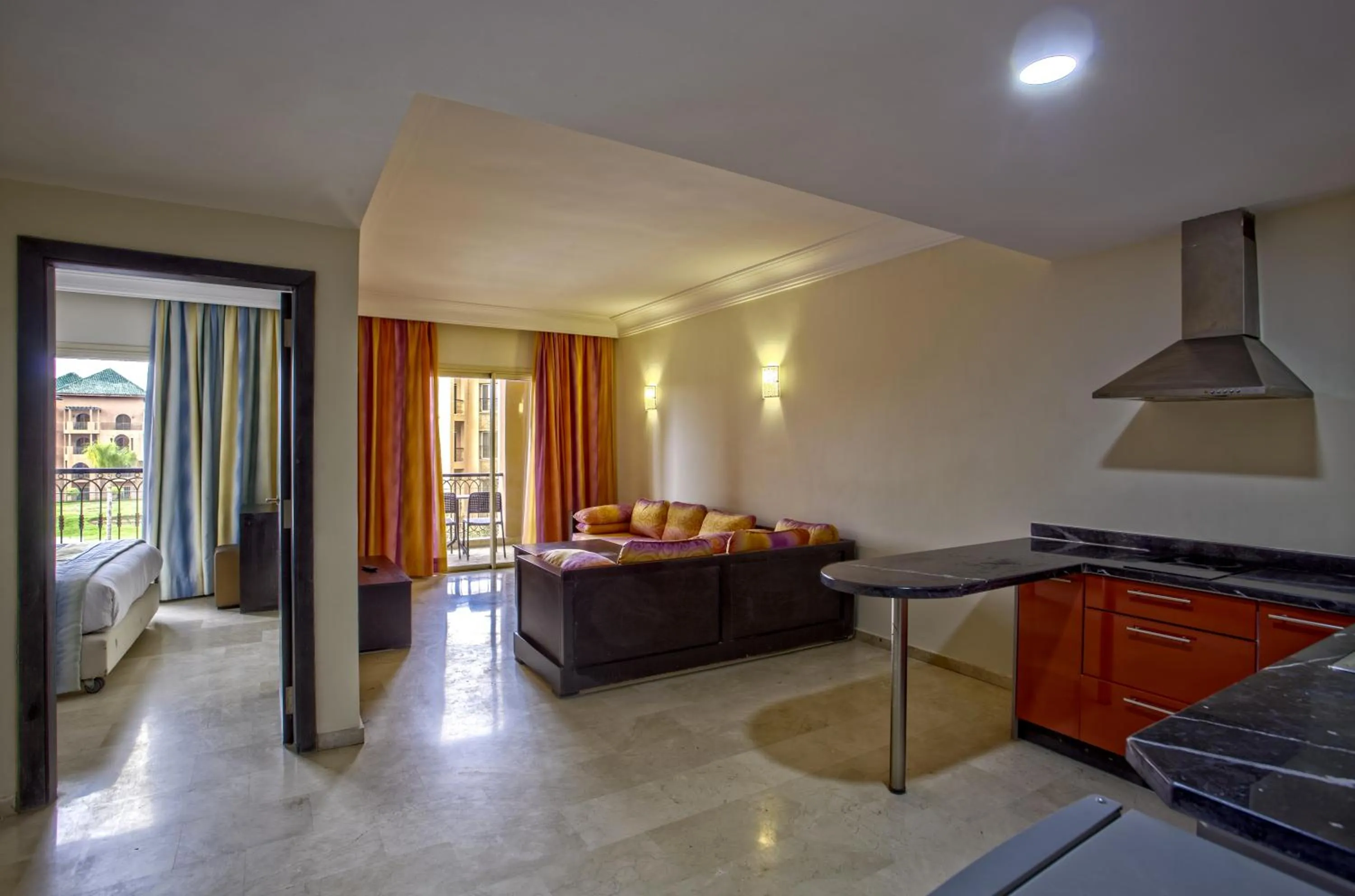 Kitchen or kitchenette, Bed in Palm Appart Hôtel Marrakech