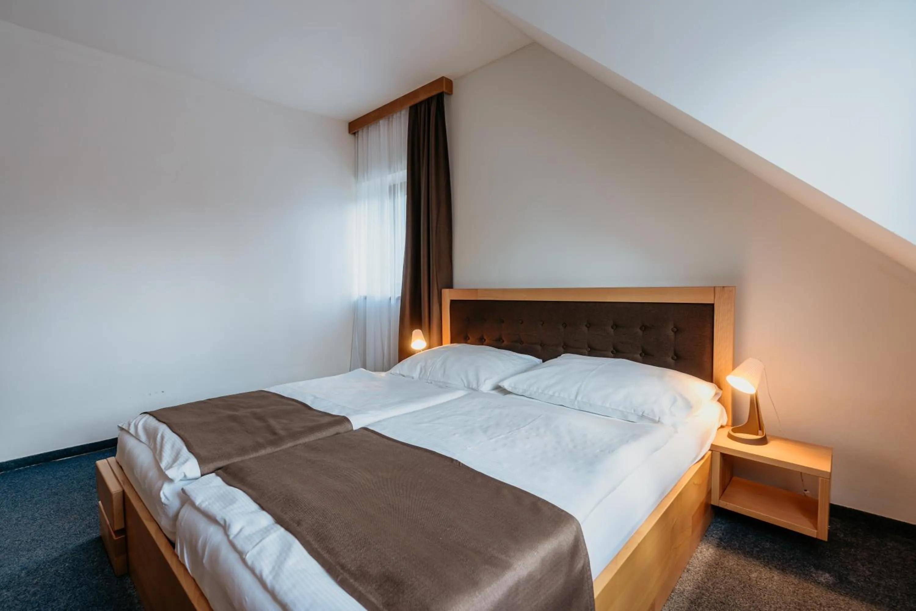 Bed in Amantis Vital Sport Hotel