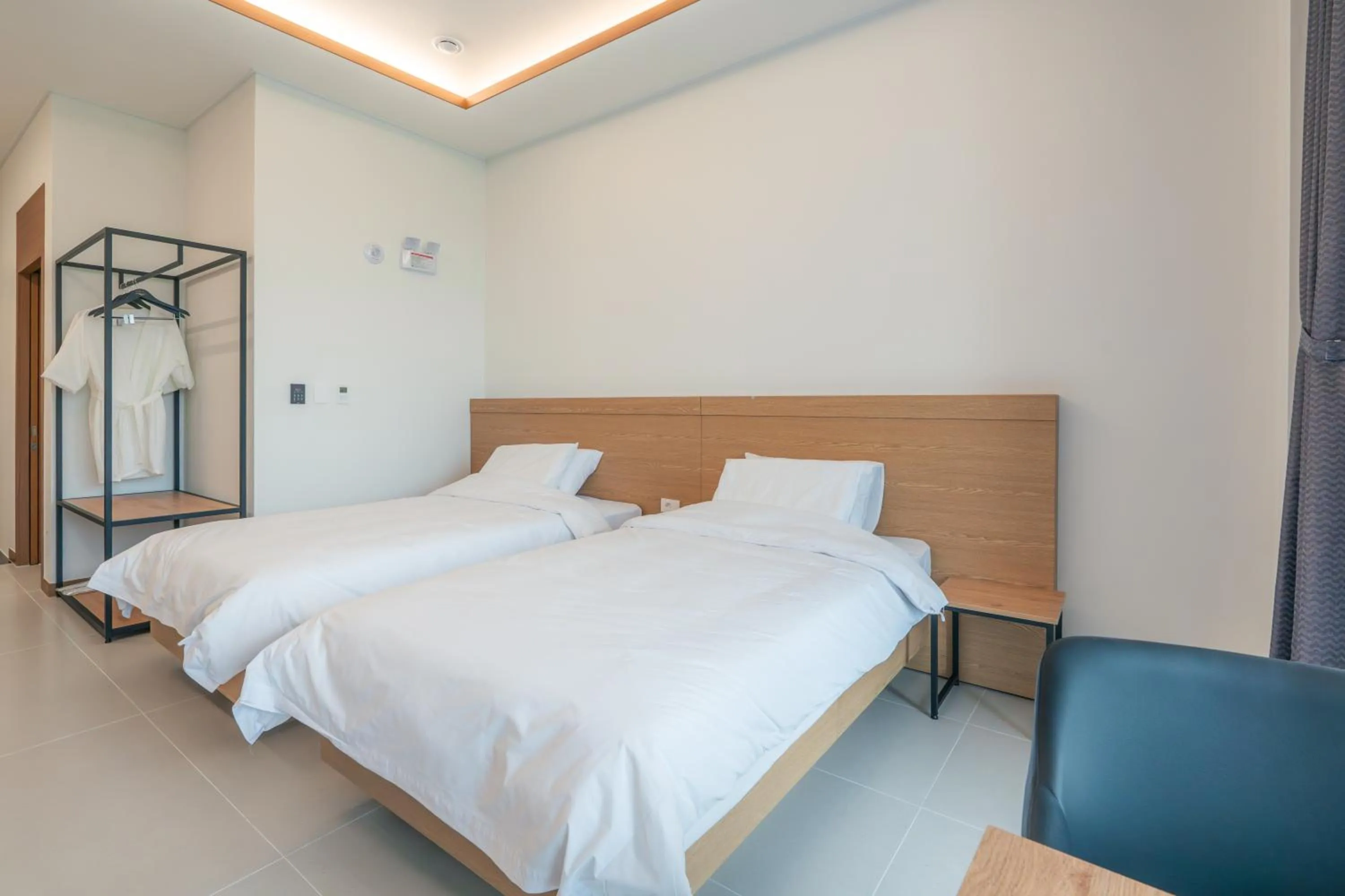 Bed in Dongho Beach Hotel