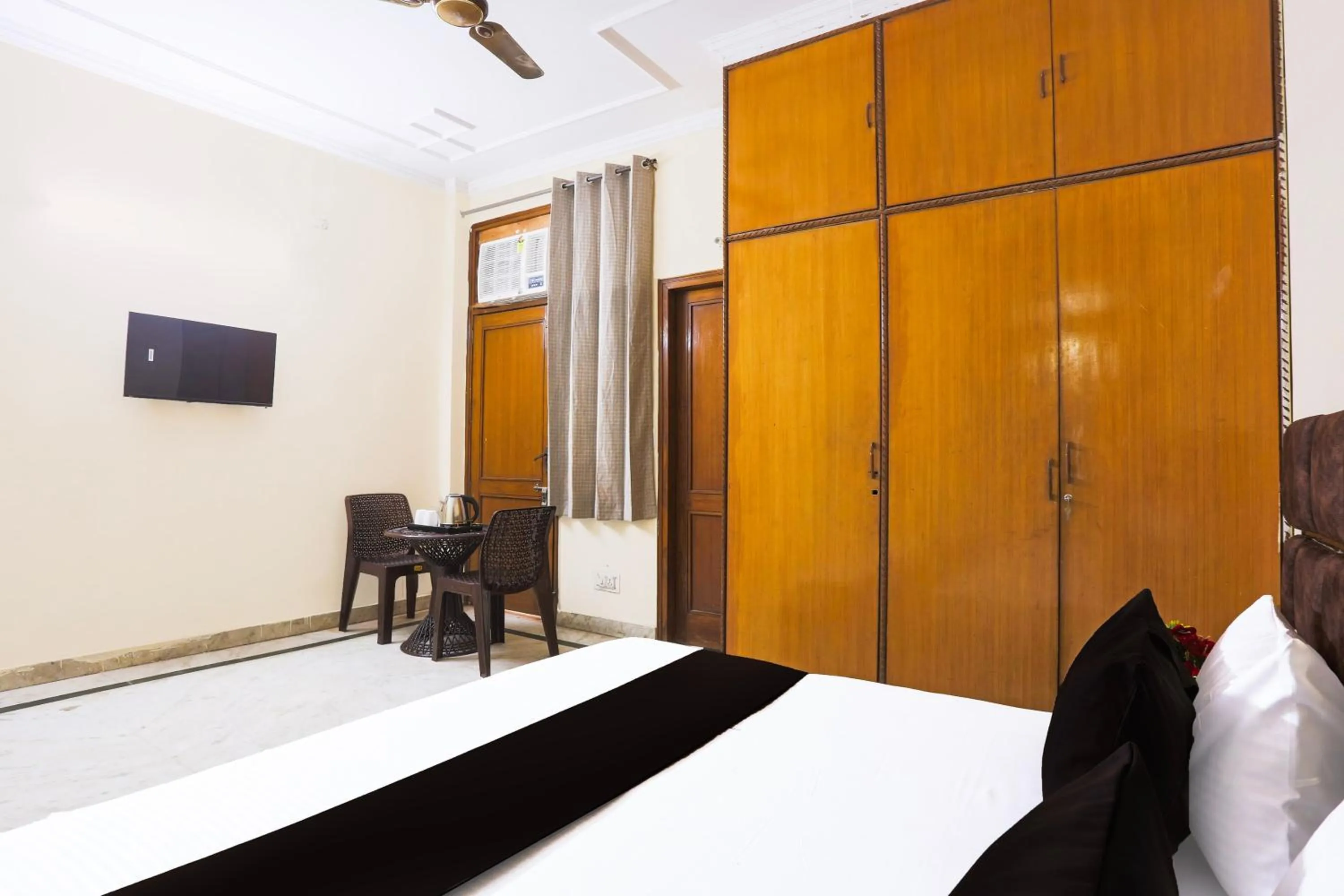 Bedroom in Hotel O JPS DC RESIDENCY