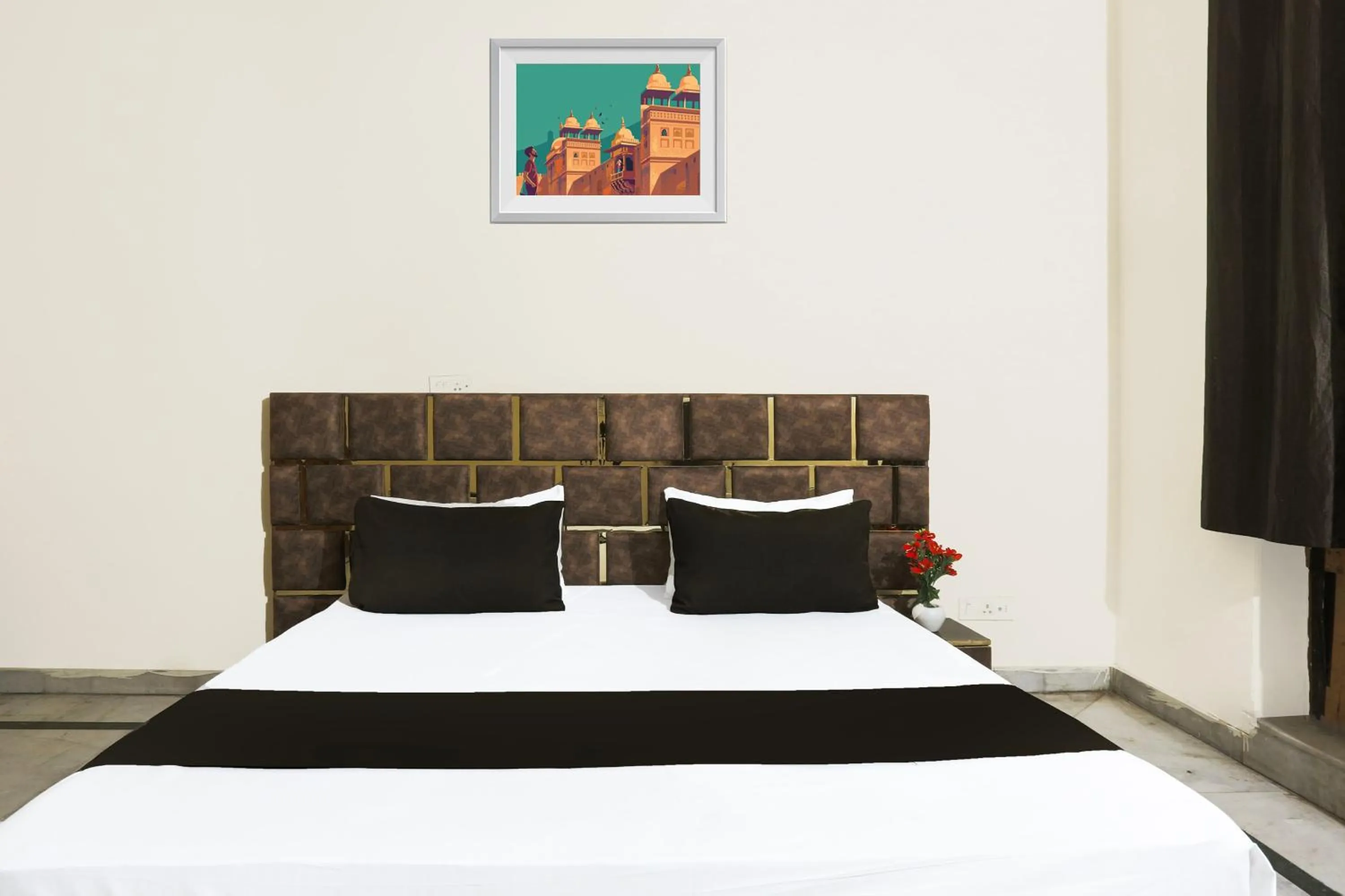 Bedroom in Hotel O JPS DC RESIDENCY