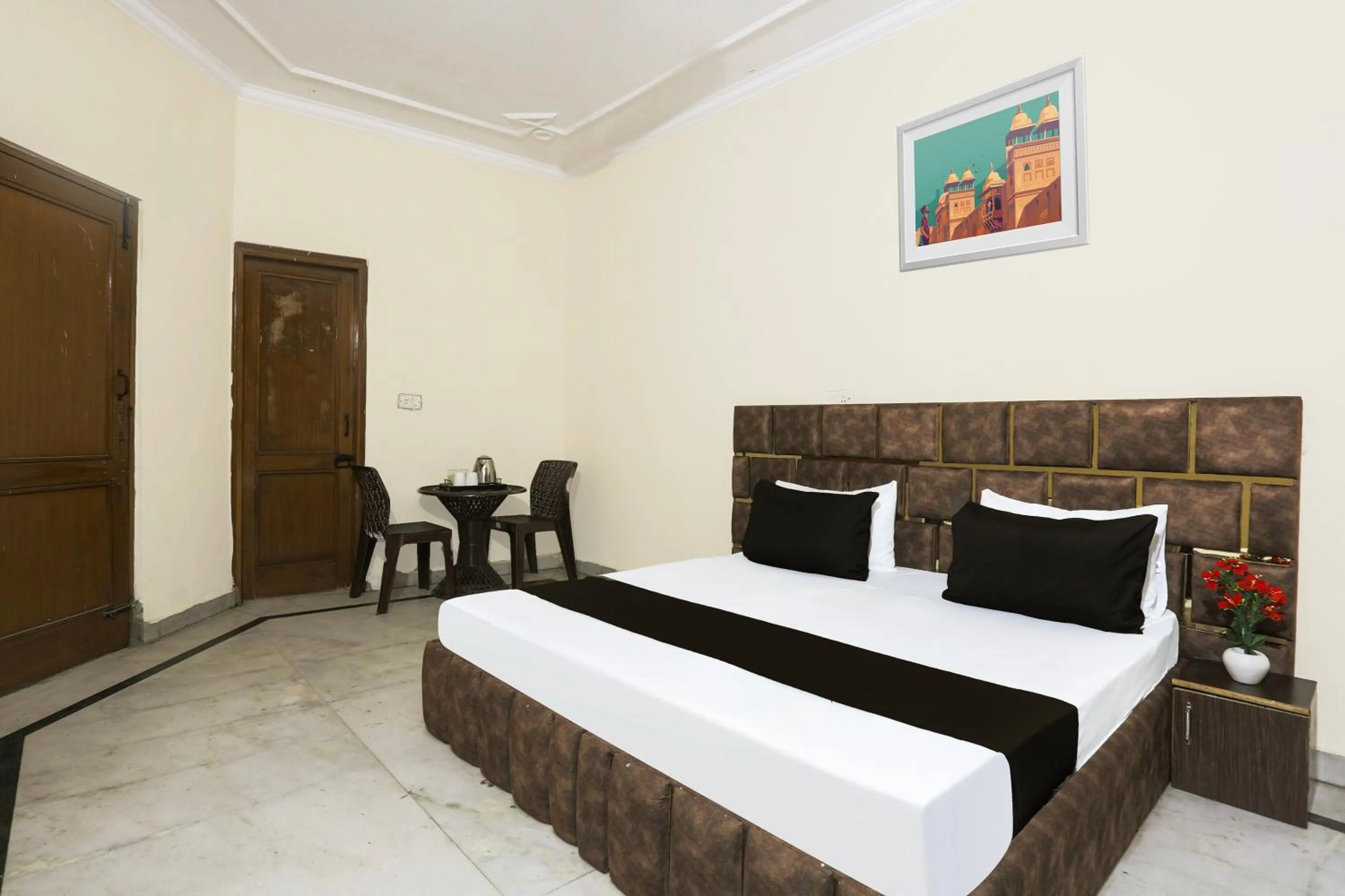 Bedroom in Hotel O JPS DC RESIDENCY