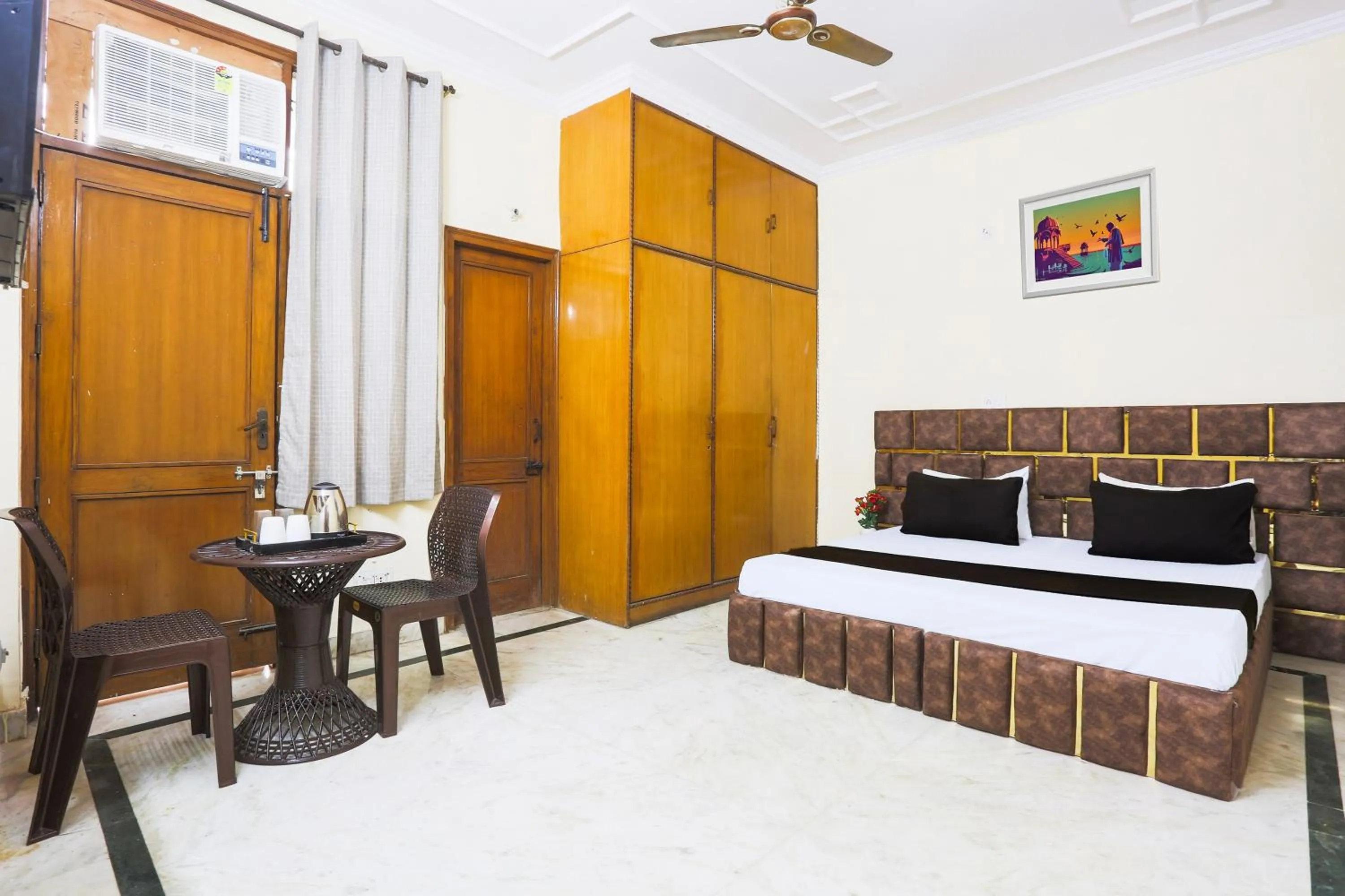 Bedroom in Hotel O JPS DC RESIDENCY