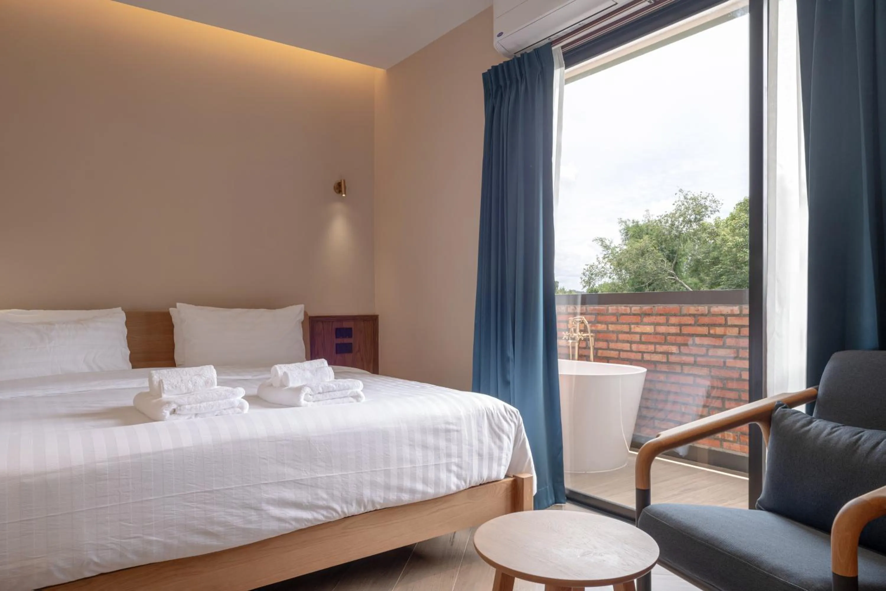 Bed in The Willoughby Maerim Hotel