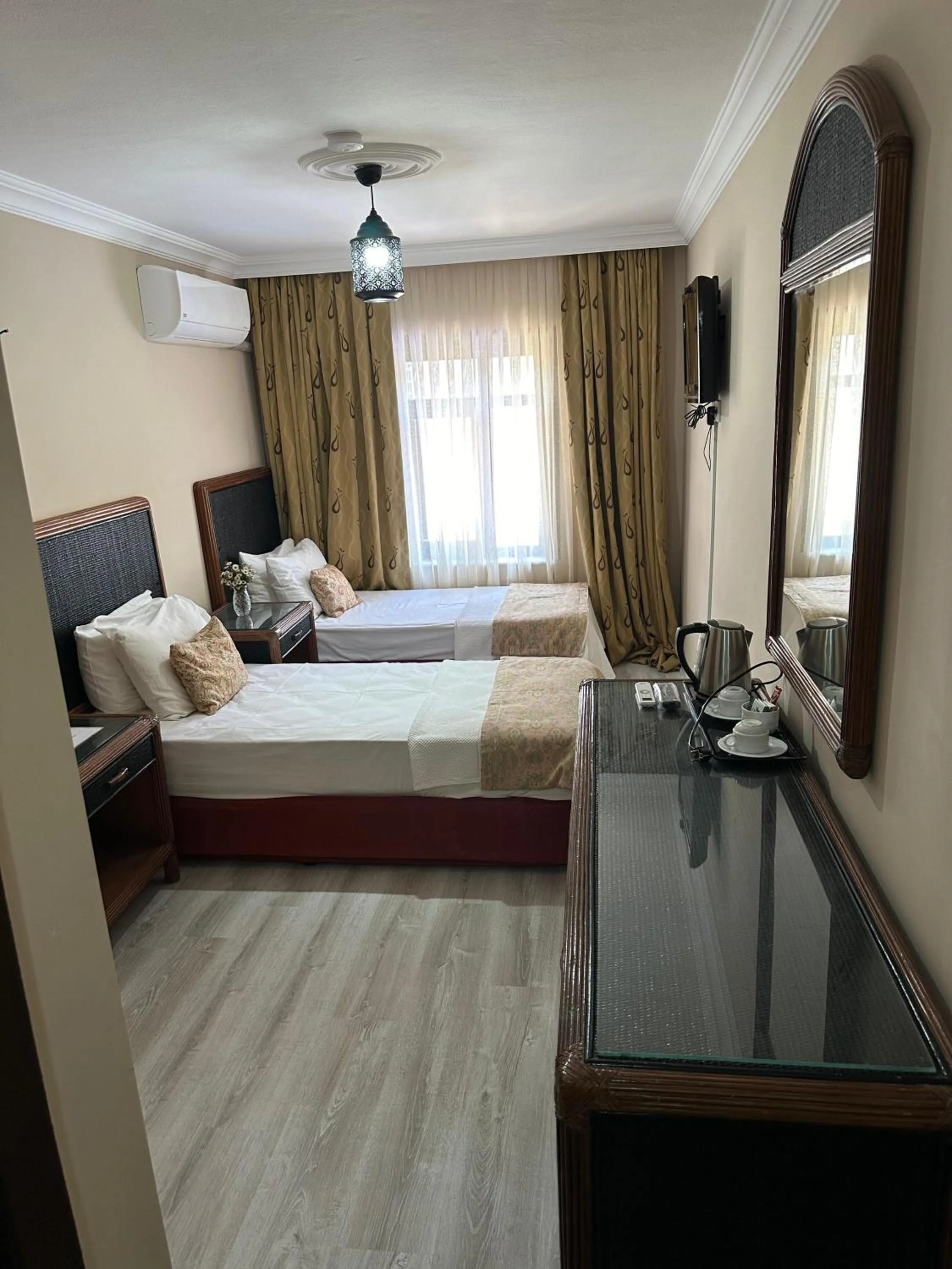 Bed in Loost Town Inn Hotel