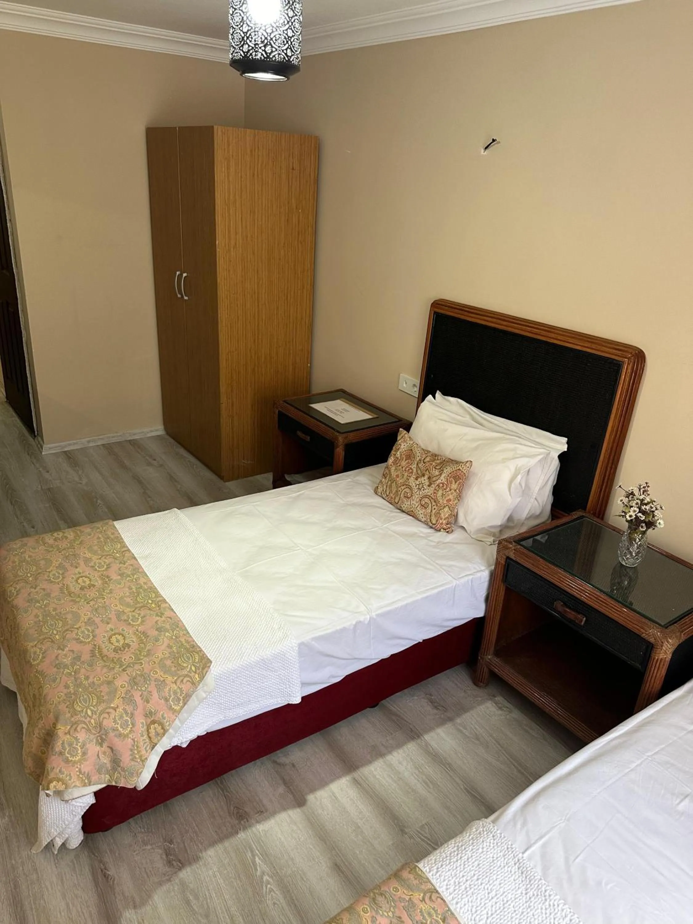 Bed in Loost Town Inn Hotel