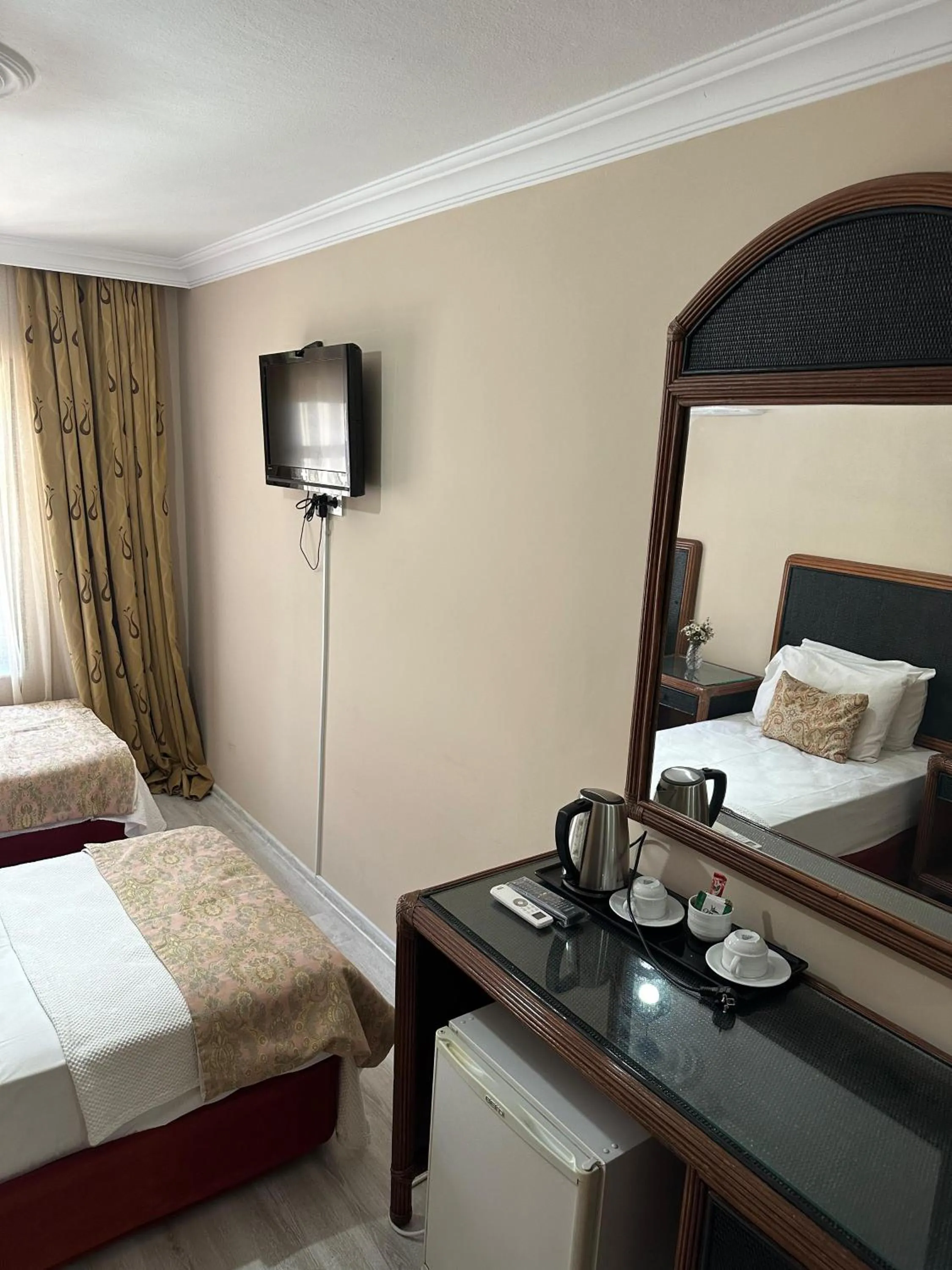 Bed in Loost Town Inn Hotel