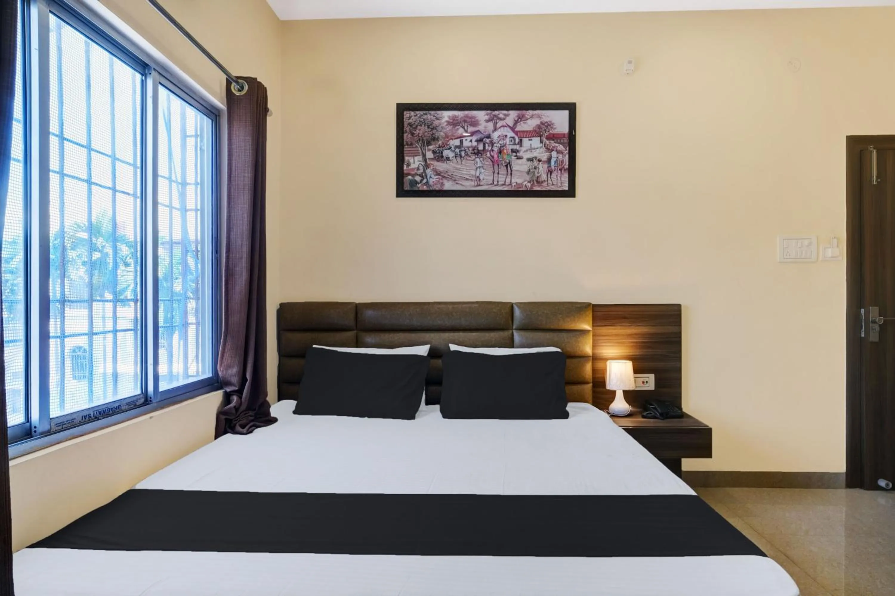 Bedroom, Bed in Super Hotel O Lalganesh formerly Royal Avenue