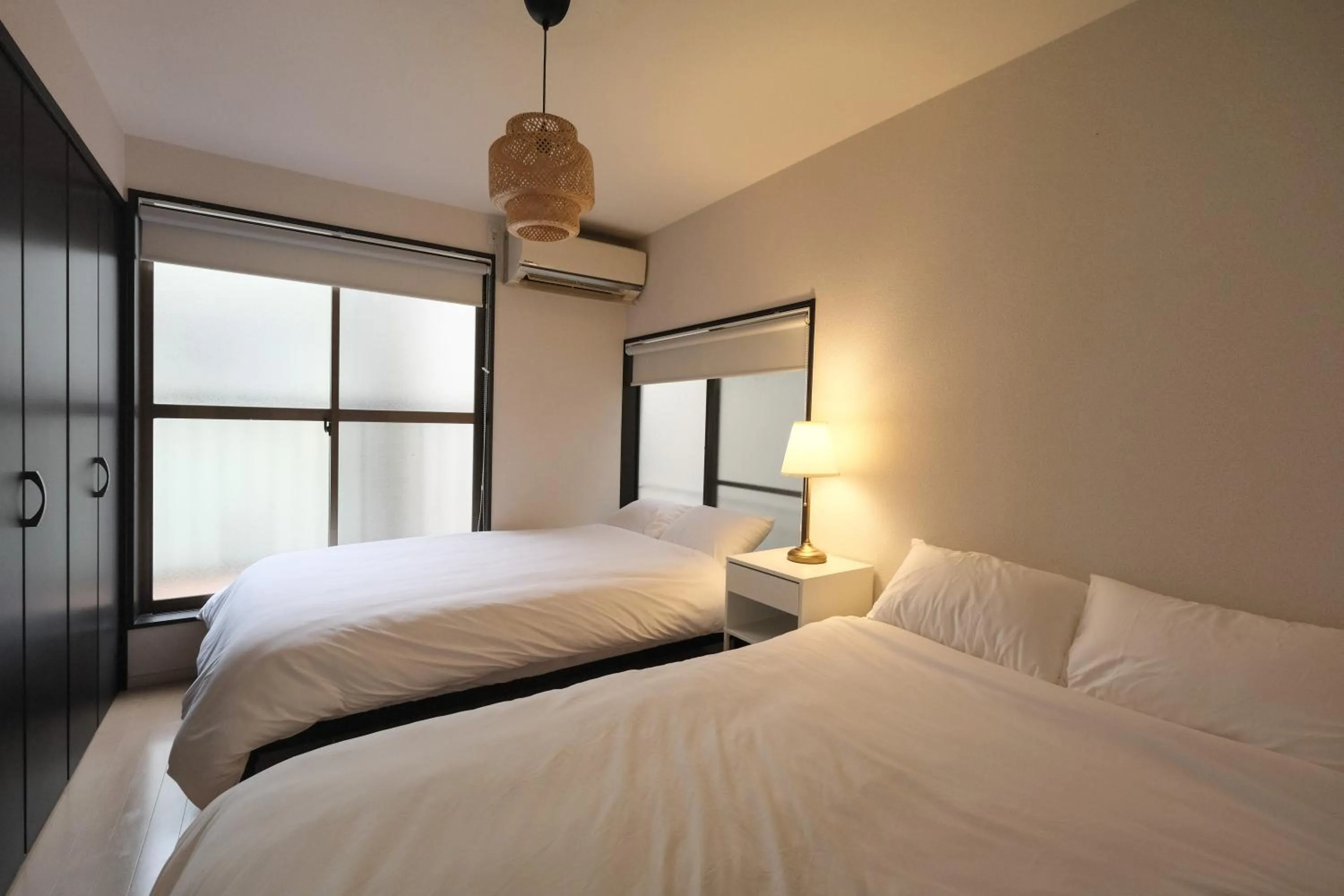 Bed in Urban House Nakano