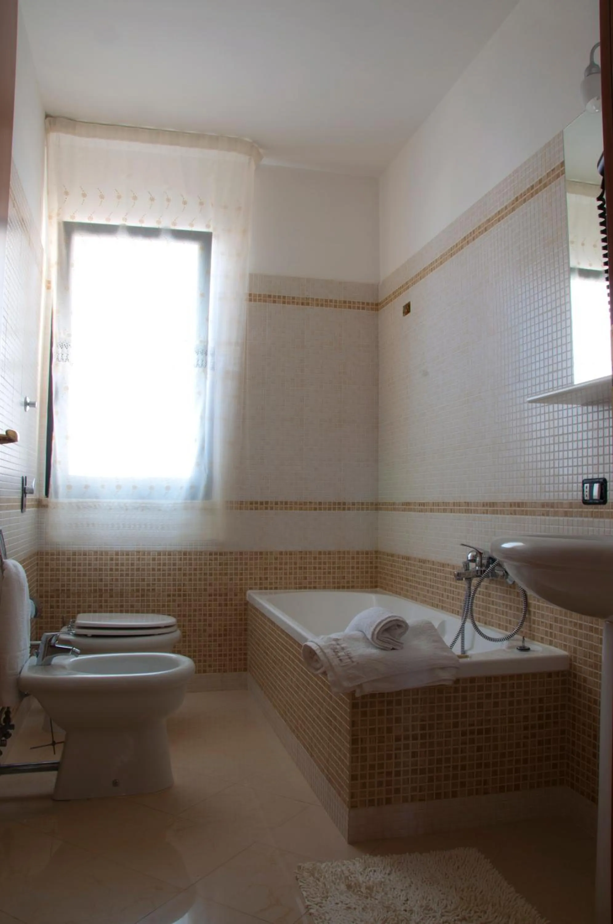 Bathroom in Residence Le Saline