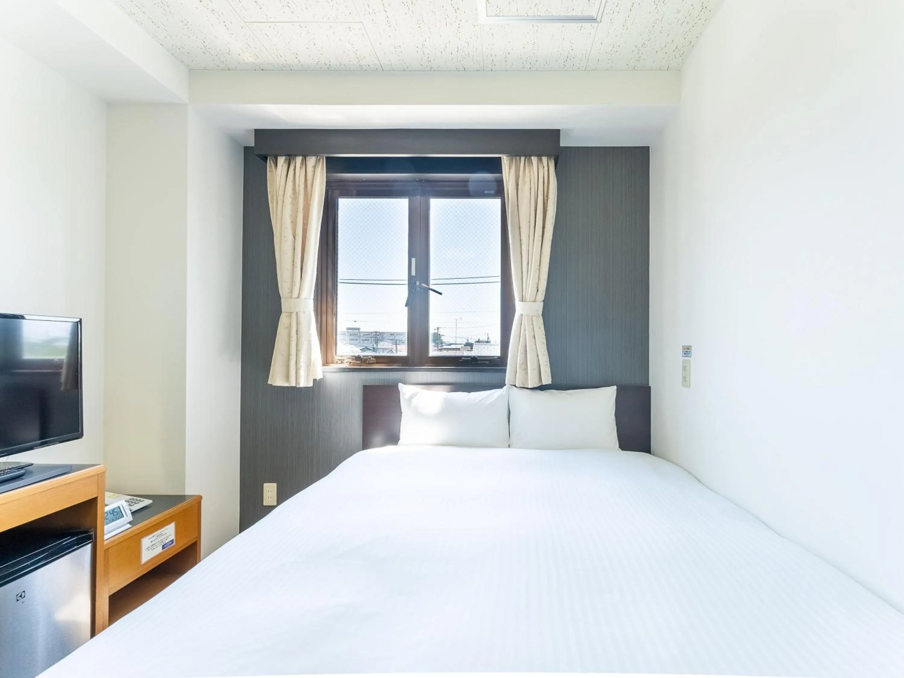 Bed in Noshiro Town Hotel Minami