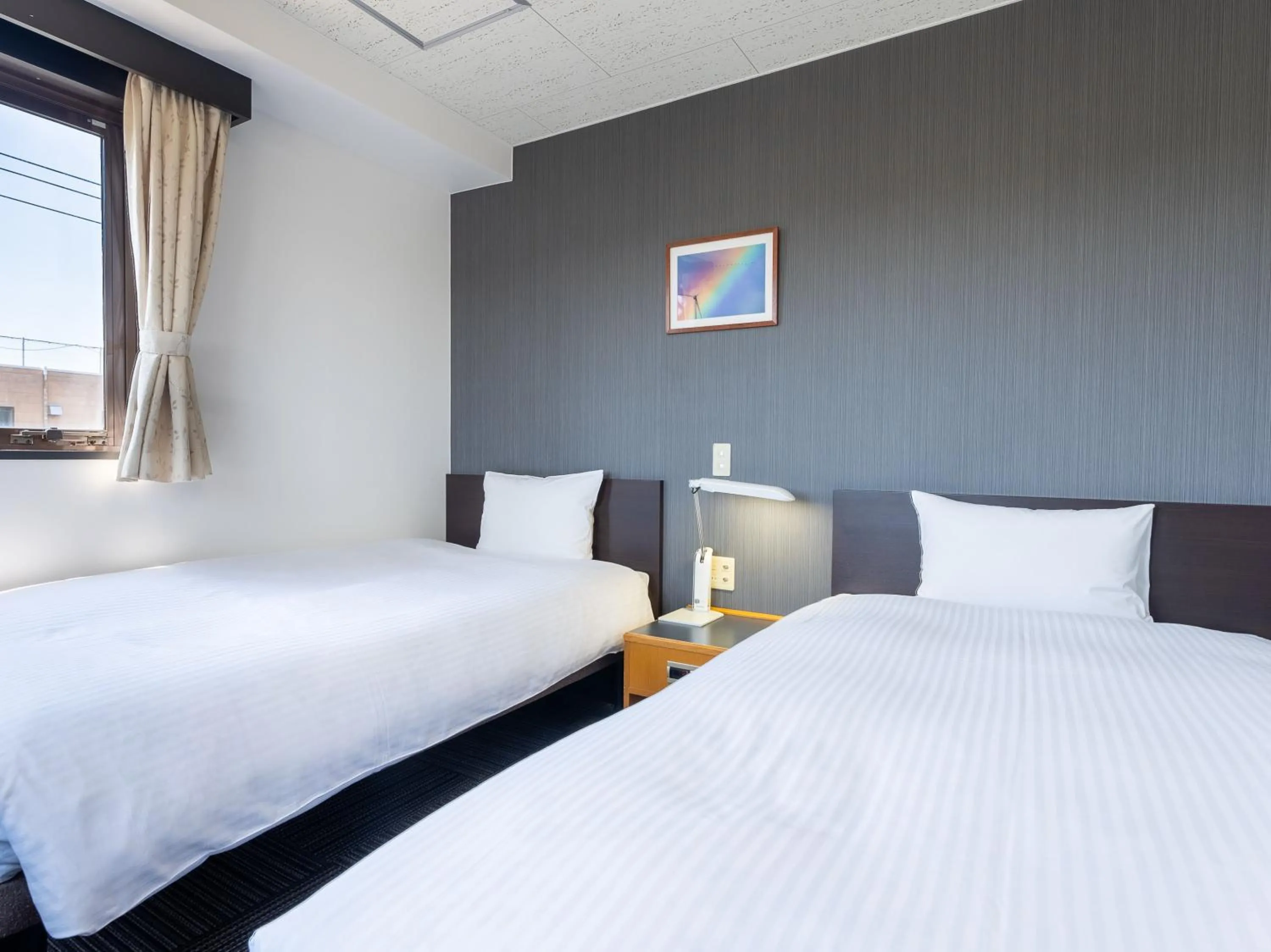 Bed in Noshiro Town Hotel Minami