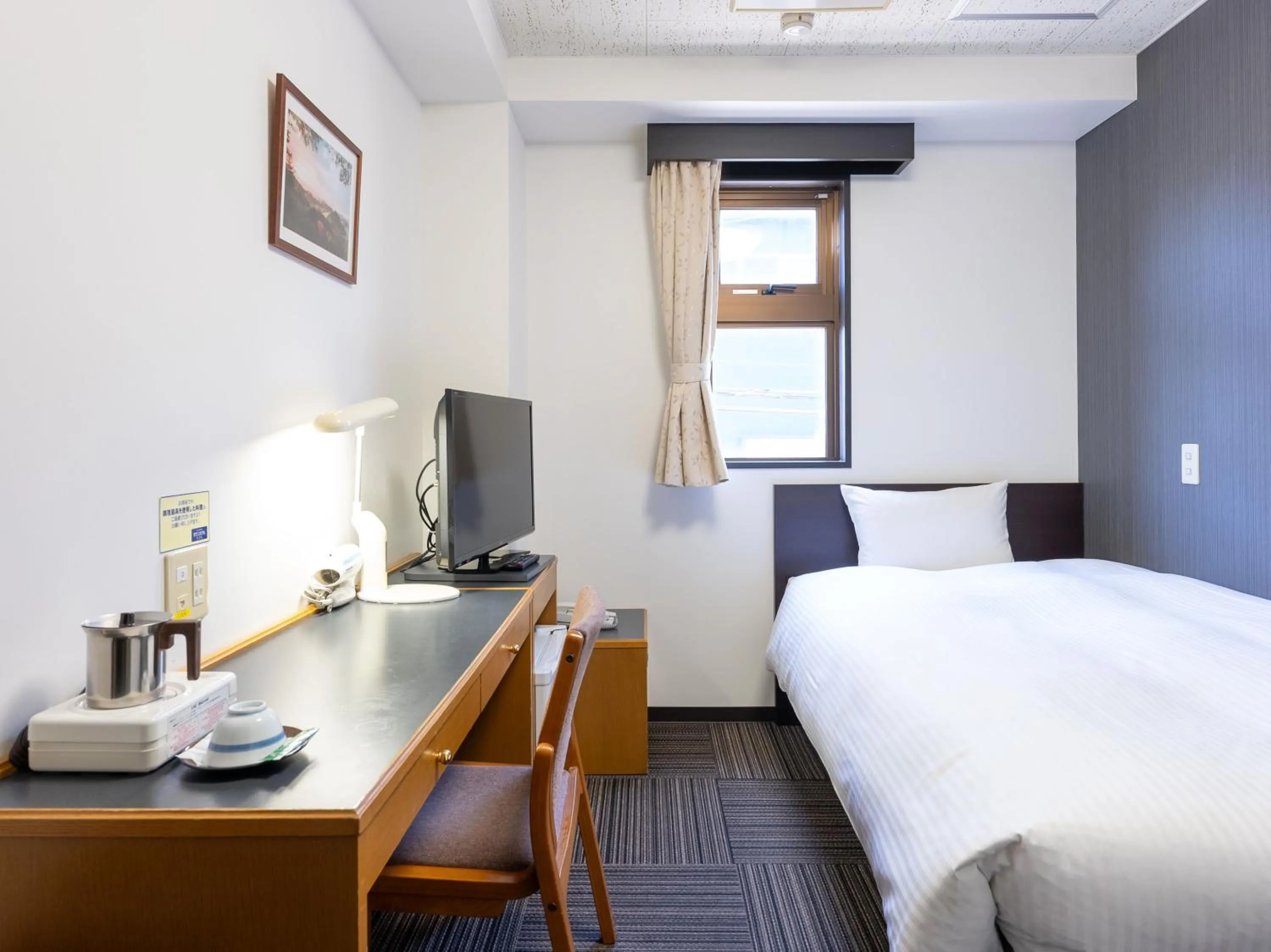 Bed in Noshiro Town Hotel Minami