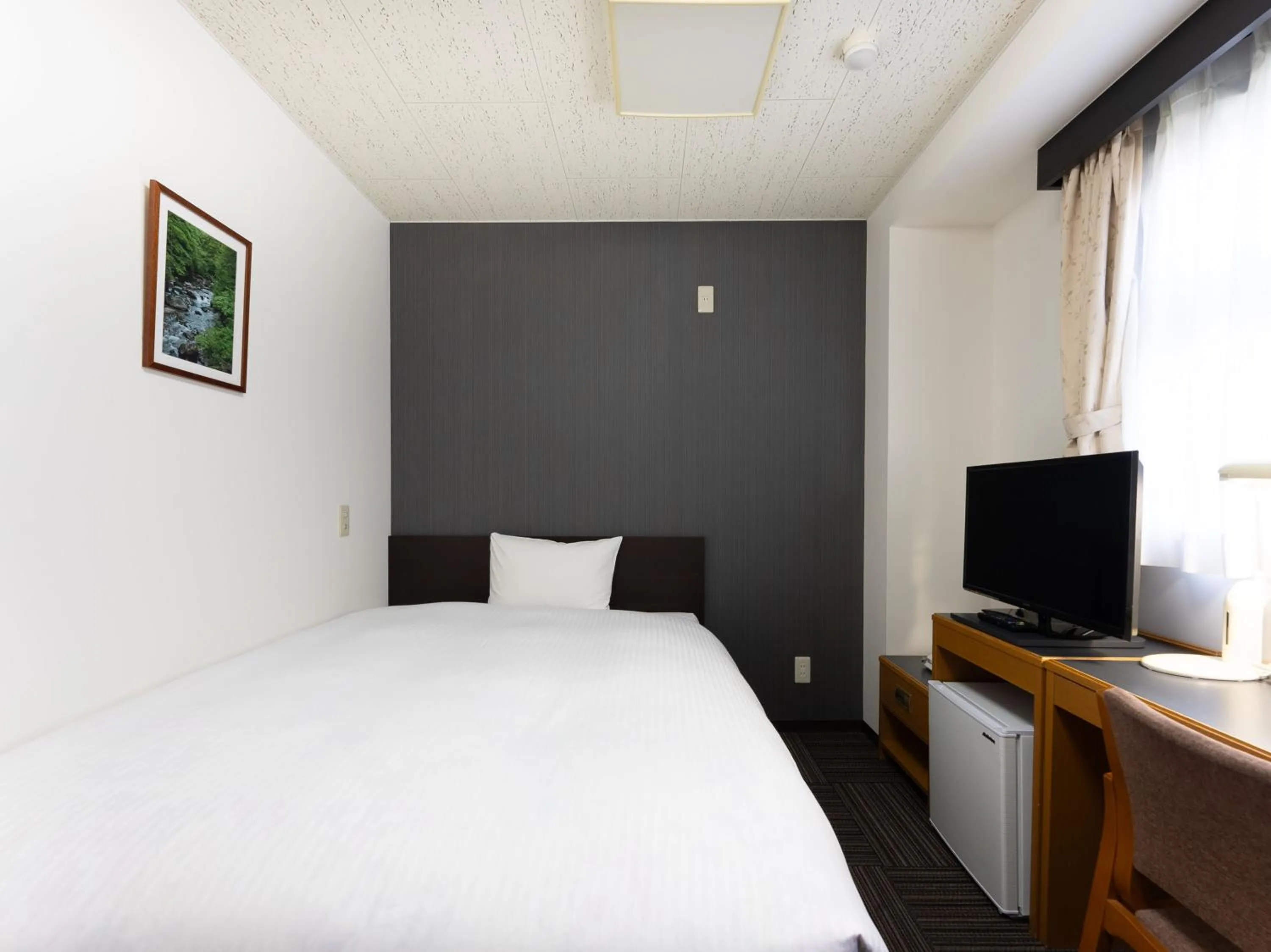Bed in Noshiro Town Hotel Minami