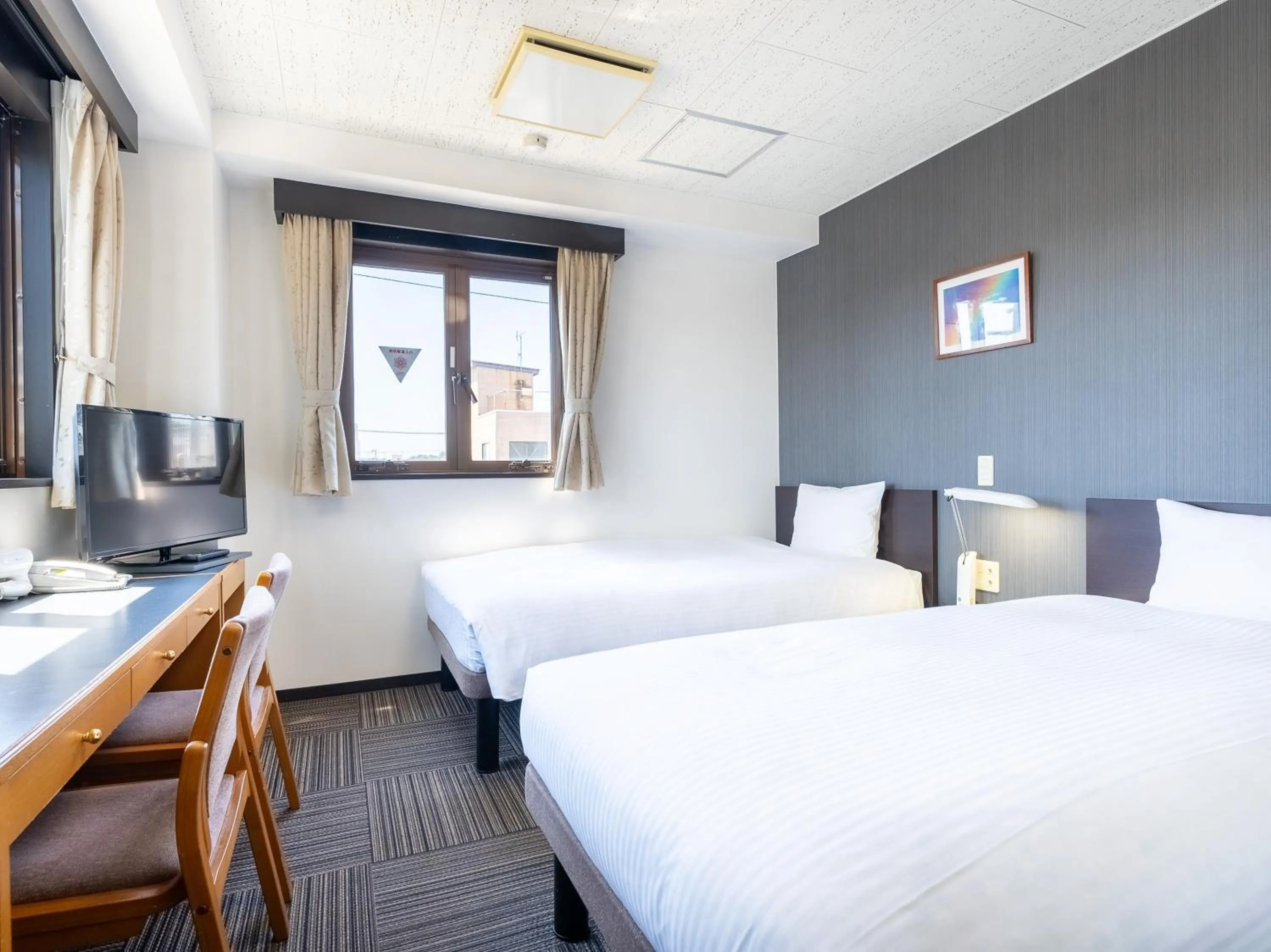 Bed in Noshiro Town Hotel Minami