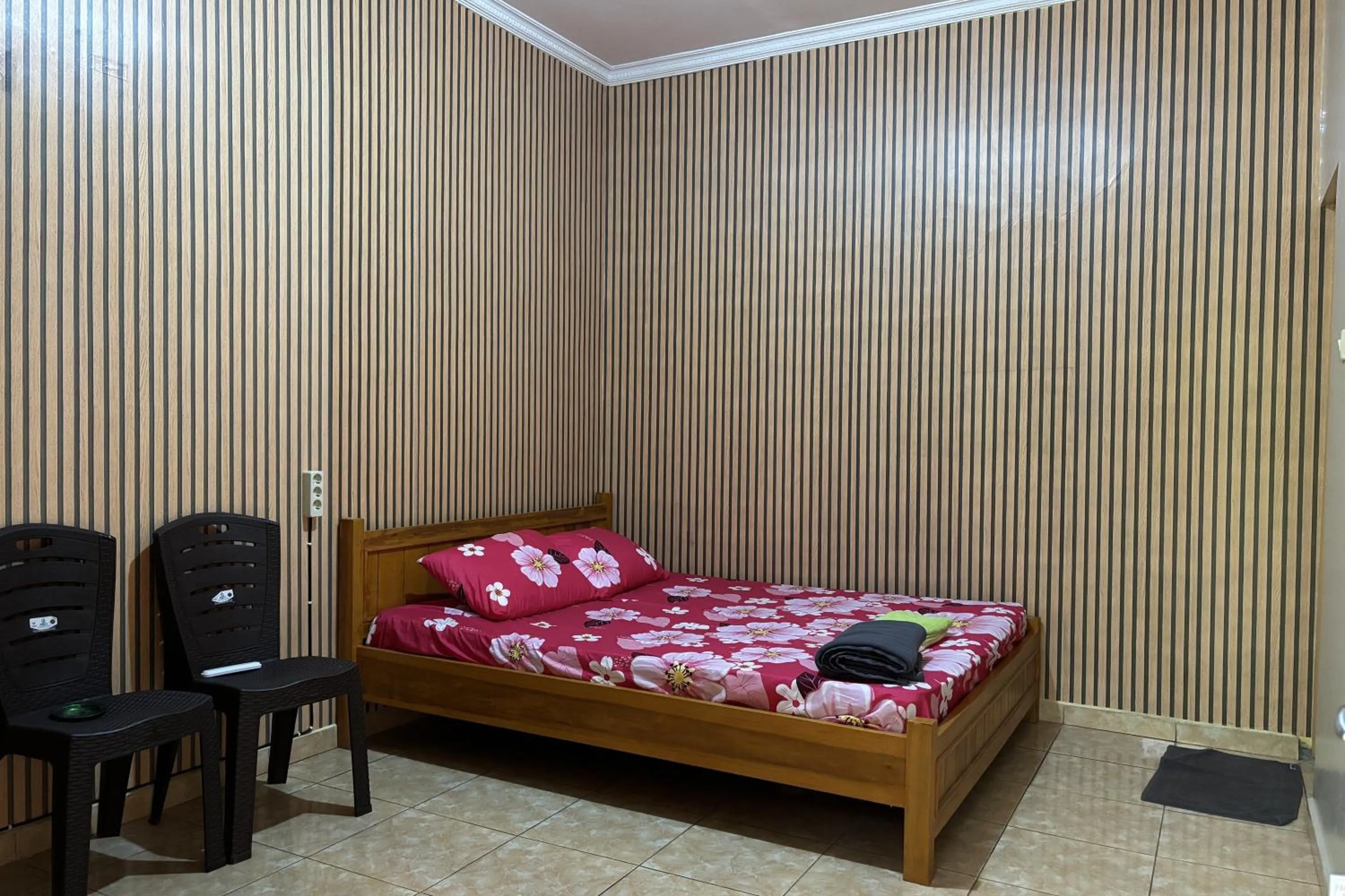 Bed in Family 24 Hotel near Pantai Cipatujah