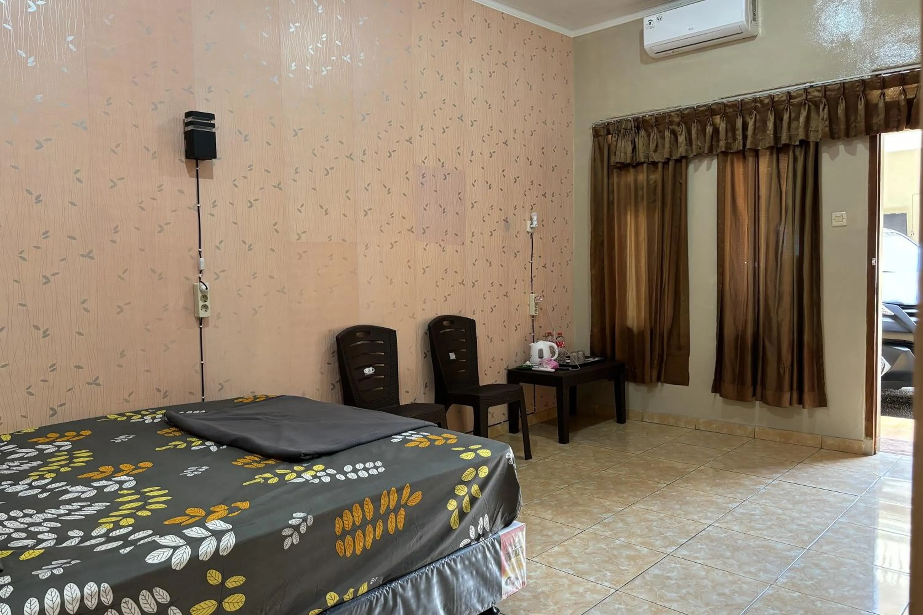 Bed in Family 24 Hotel near Pantai Cipatujah