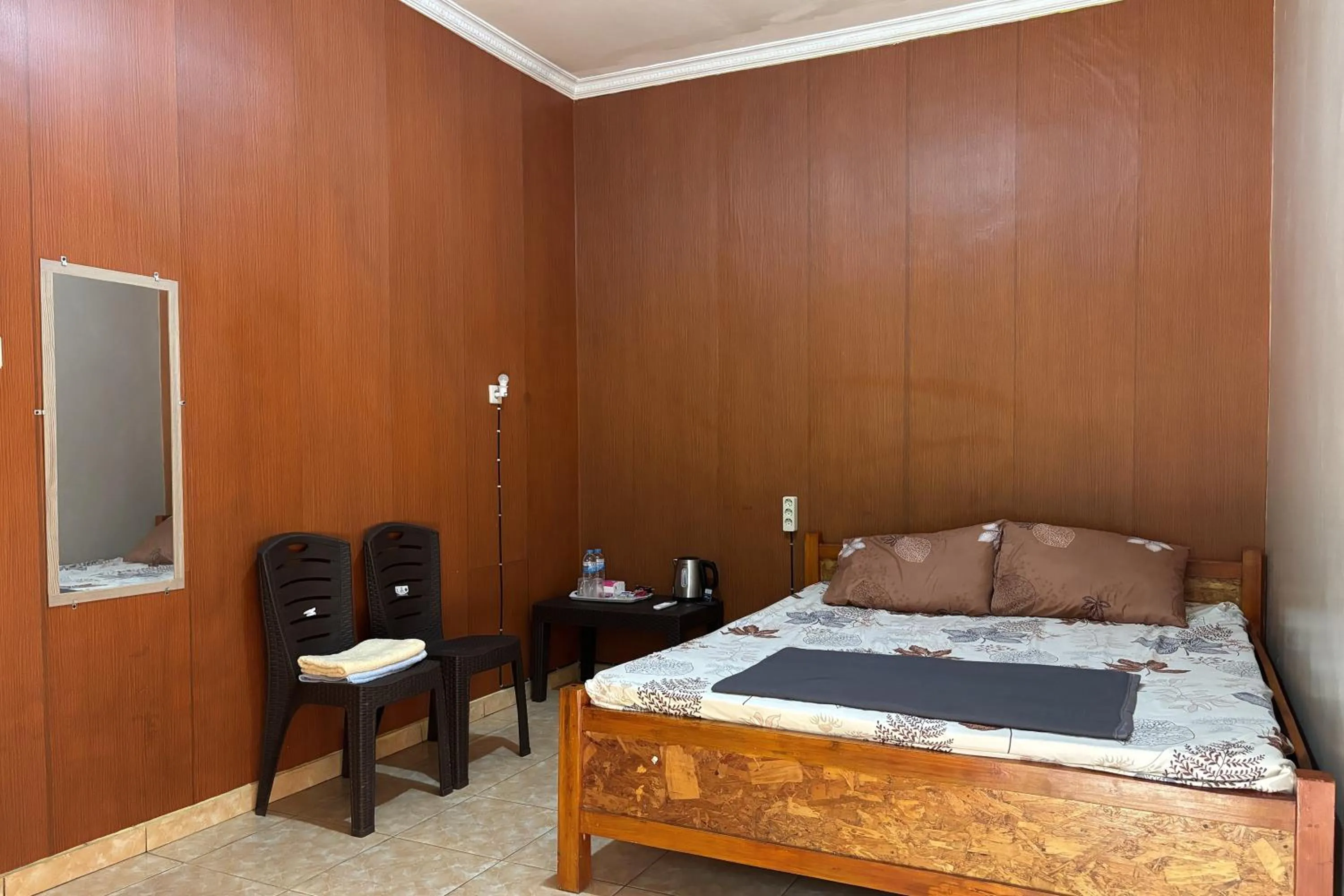 Bed in Family 24 Hotel near Pantai Cipatujah