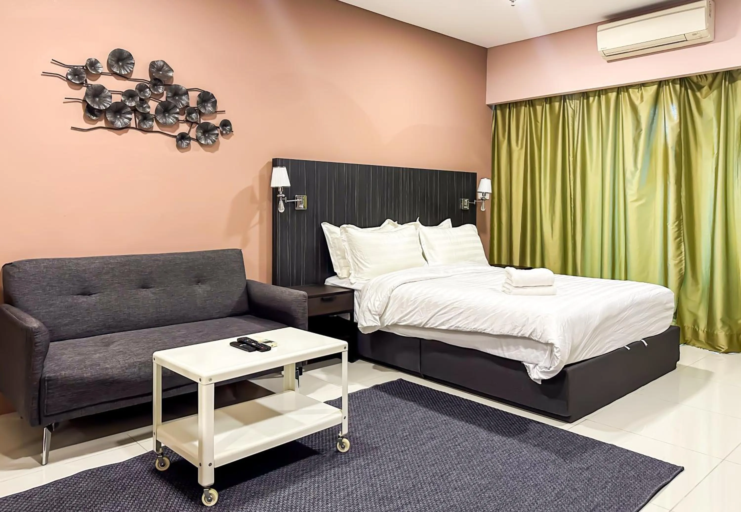 Bed in Summer Suites KLCC by apartx