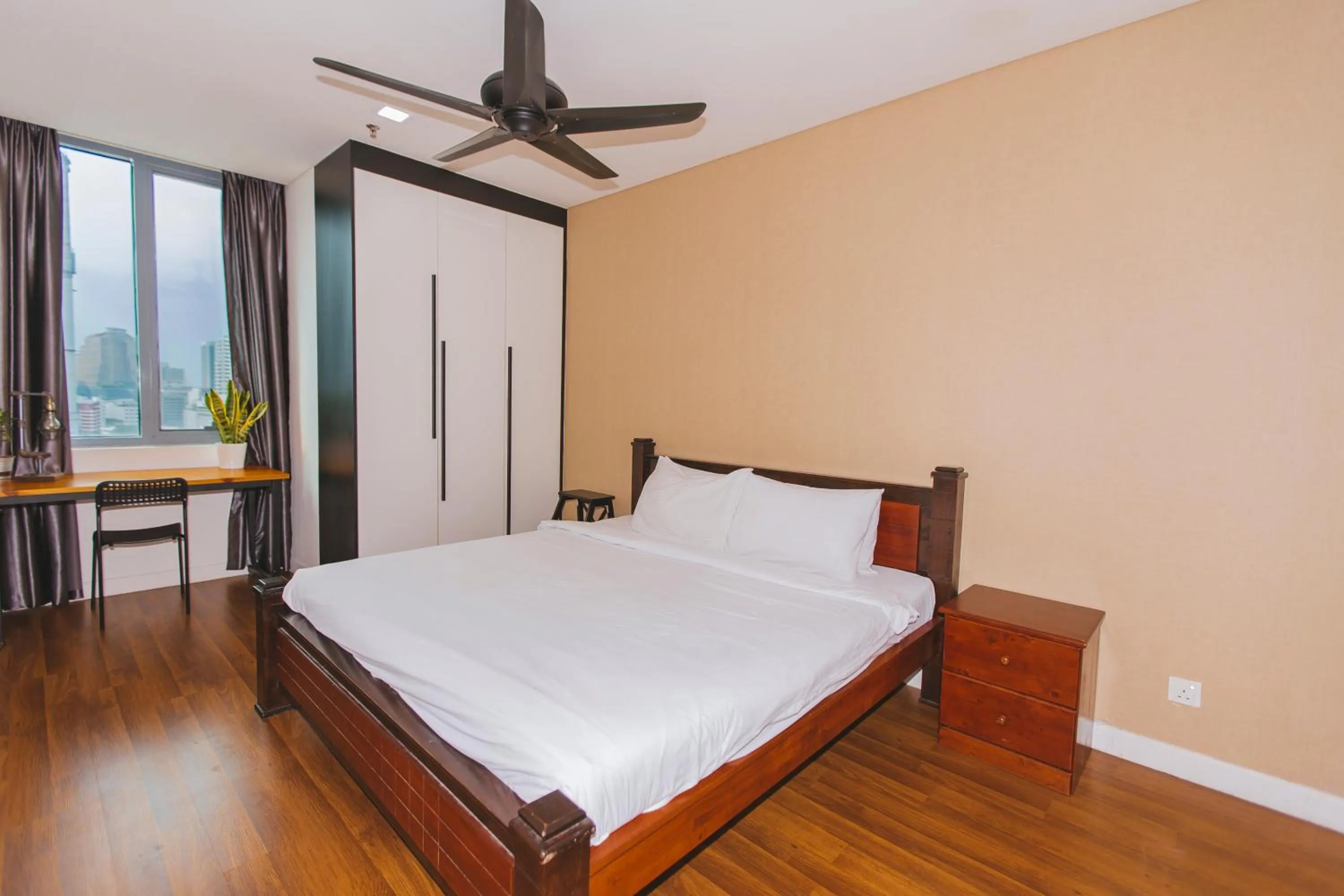 Bed in Summer Suites KLCC by apartx
