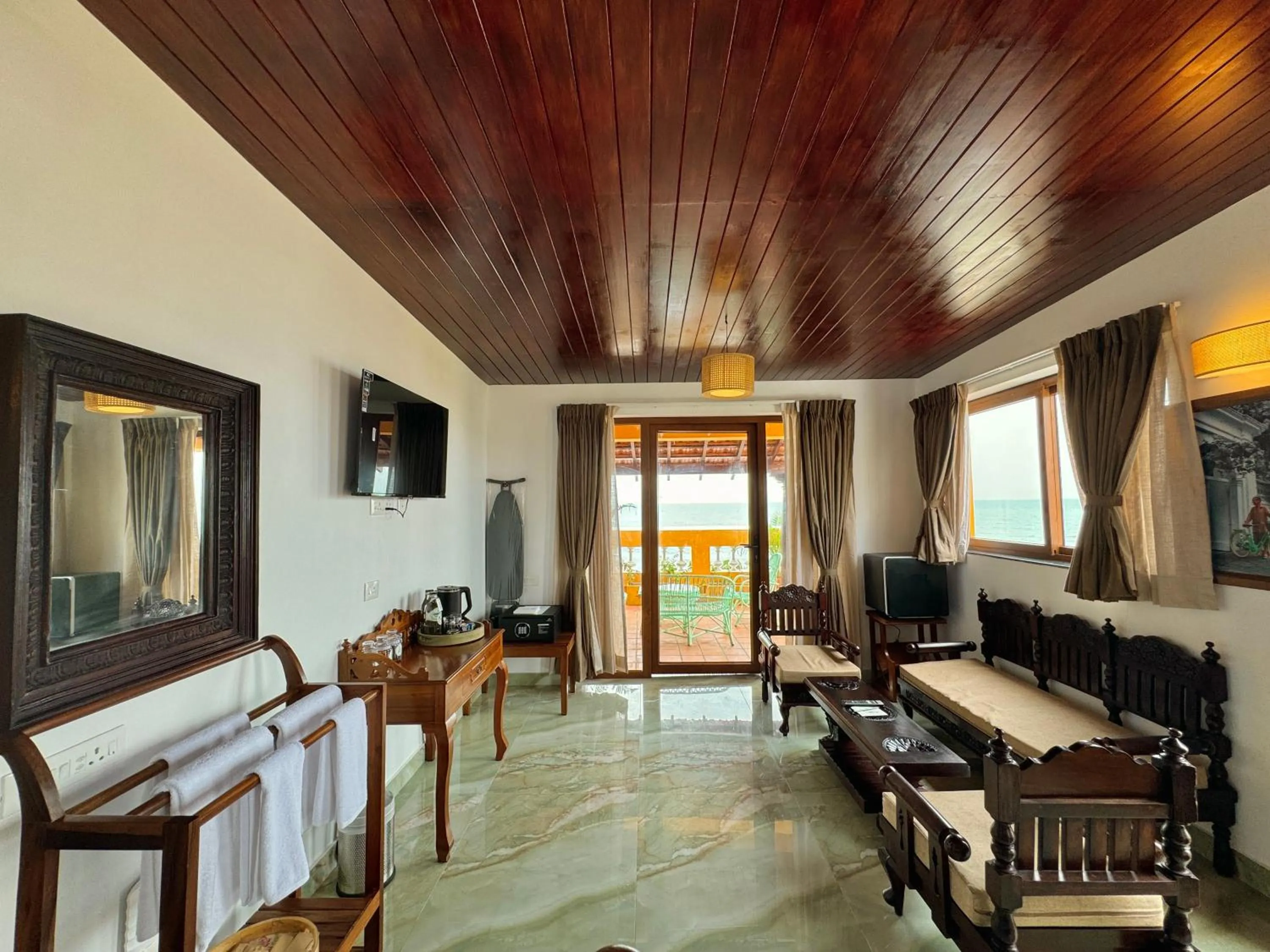 Seating area in La Plage Seaview Suites