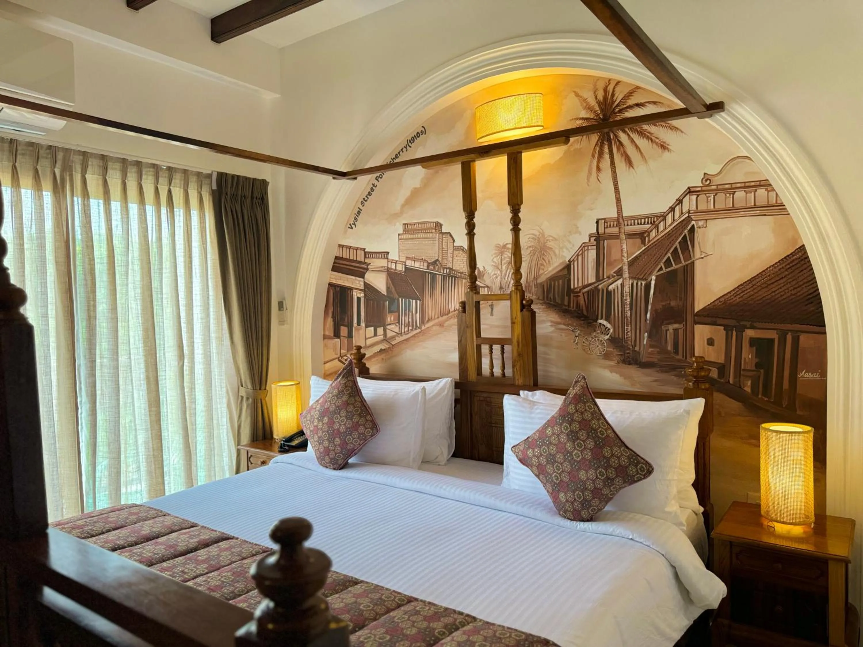 Bed in La Plage Seaview Suites