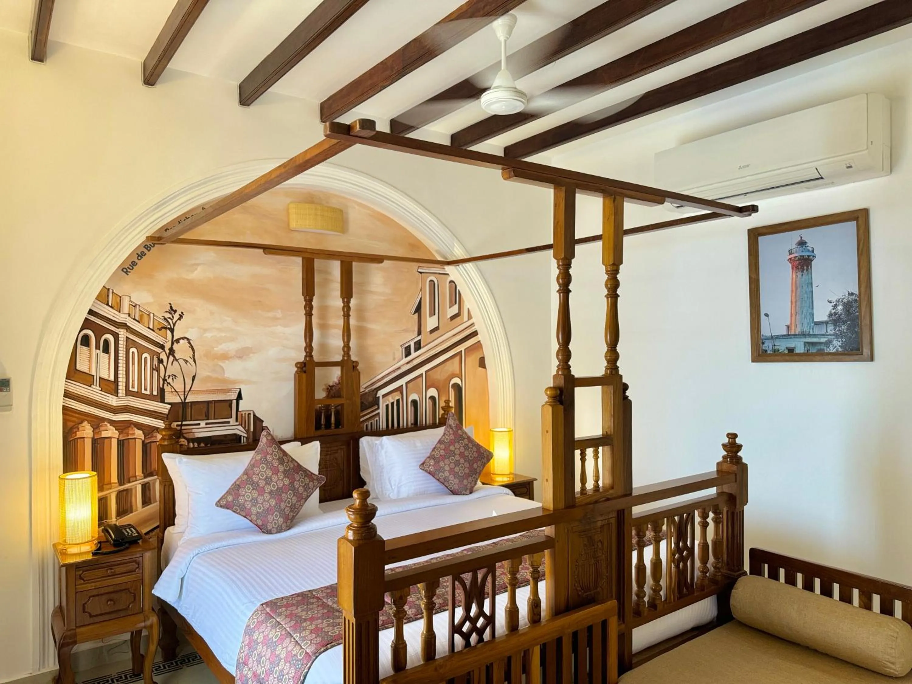 Bed in La Plage Seaview Suites