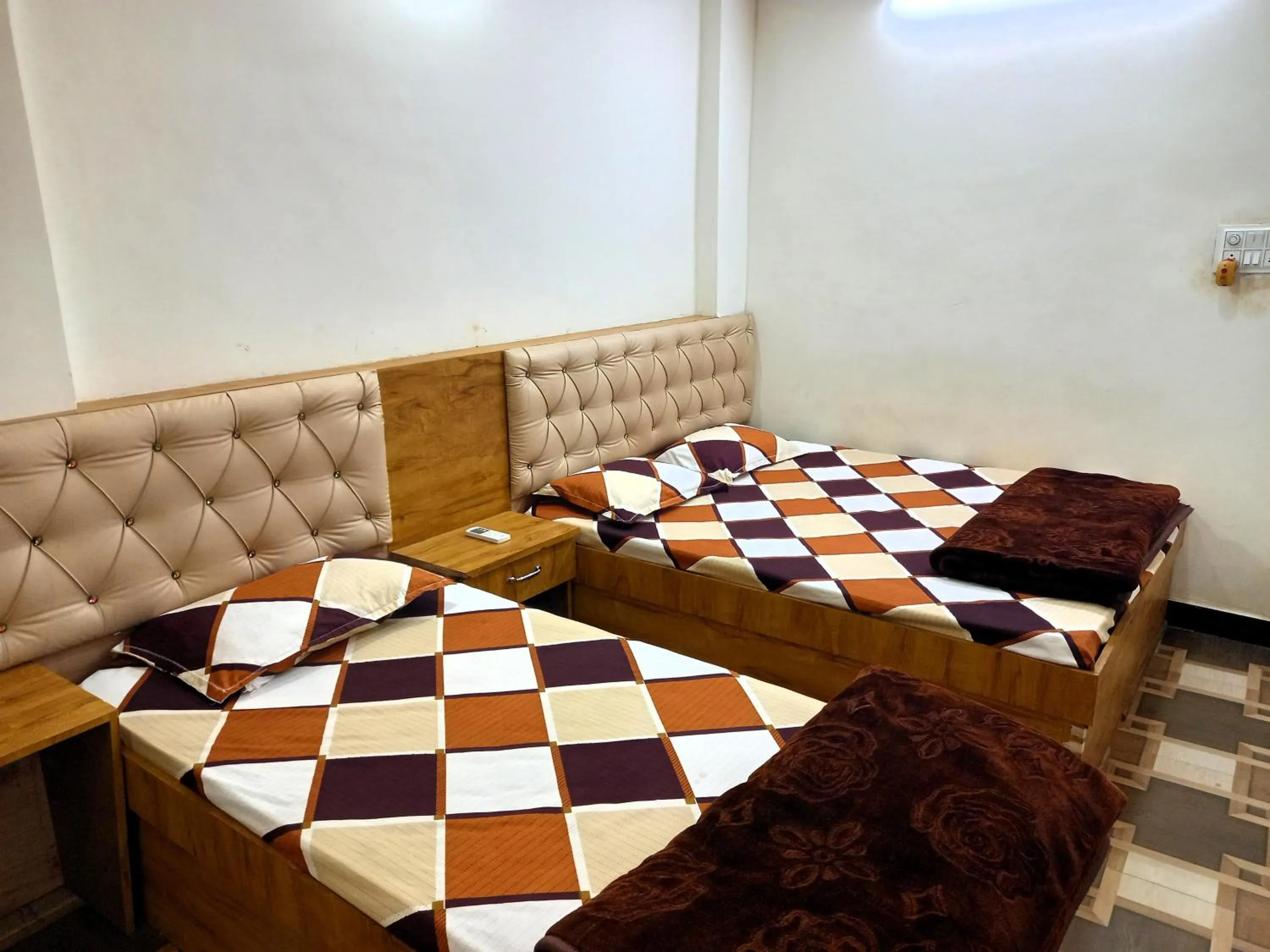 Bed in Hotel Yuvan Palace